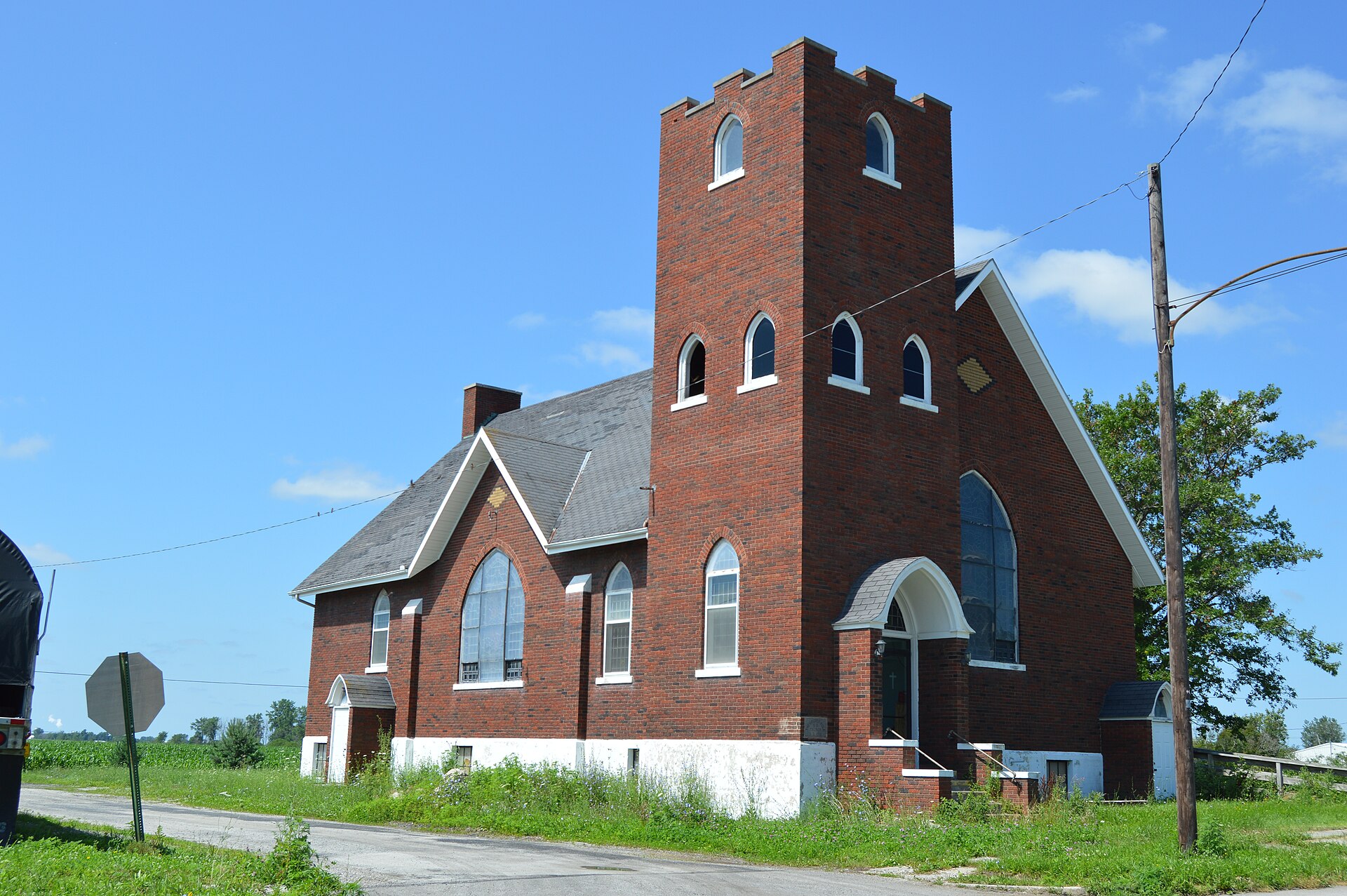 Front and eastern side of the former Golden Rule United Methodist Church (United Brethren when built in 1931), located at the junction of Main and East Streets in Belmore, Ohio, United States.