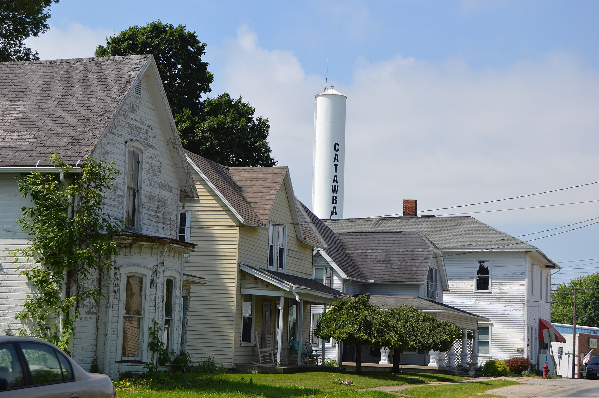 Houses on the southern side of Pleasant Street west of the Lorraine Street intersection in Catawba, Ohio, United States.