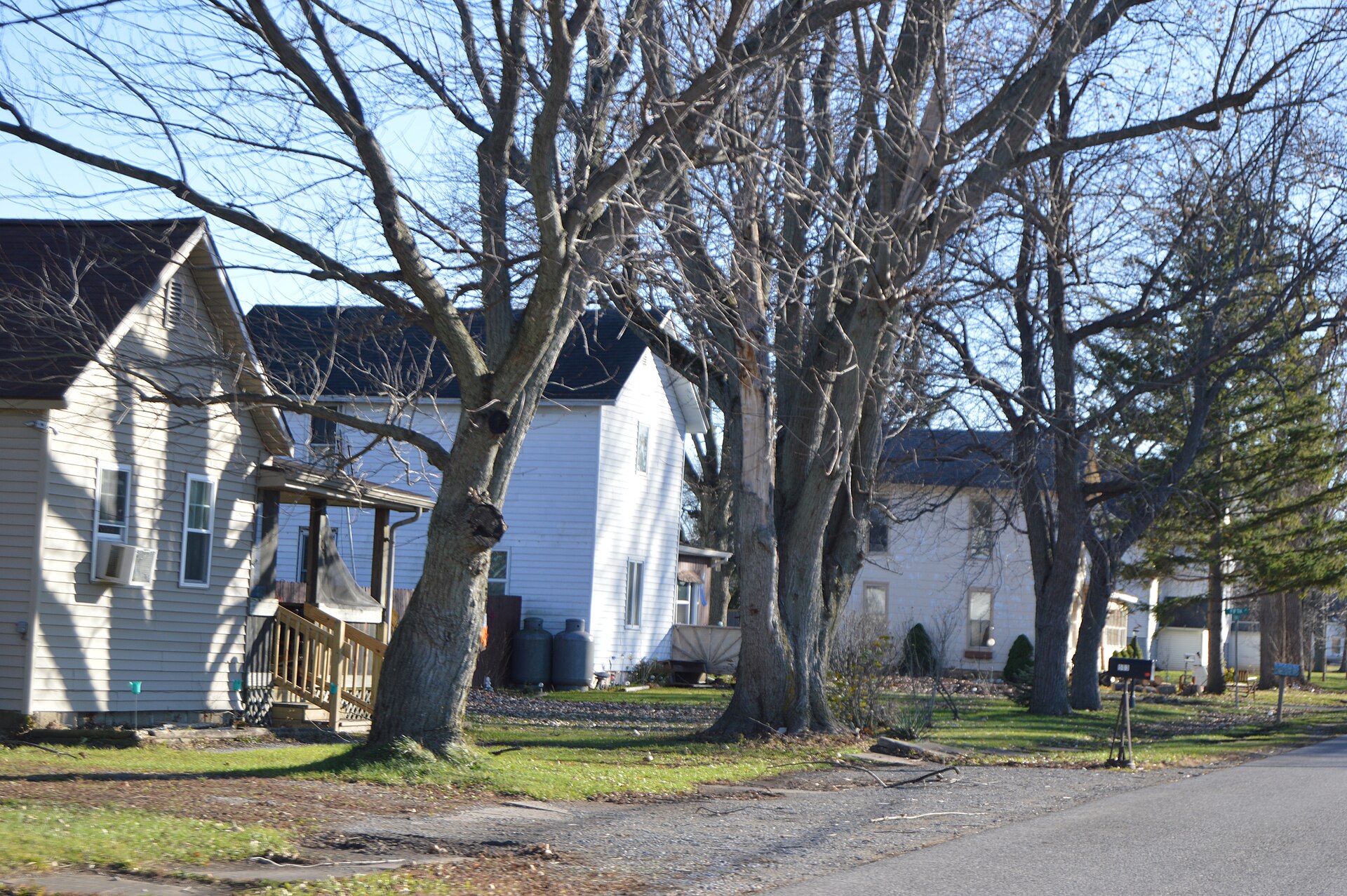 Houses on the eastern side of Main Street north of Fifth Street in Cecil, Ohio, United States.