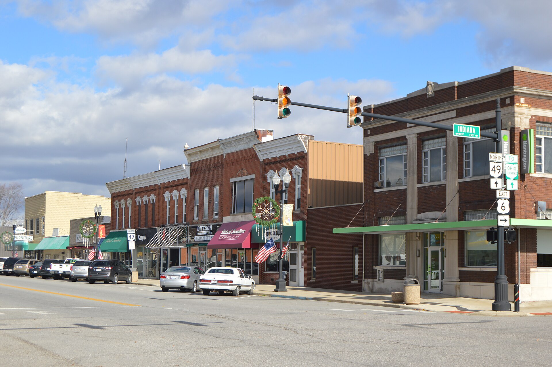 Buildings on the eastern side of Michigan Avenue (State Route 49) at its intersection with Indiana Street (U.S. Route 6) in Edgerton, Ohio, United States.