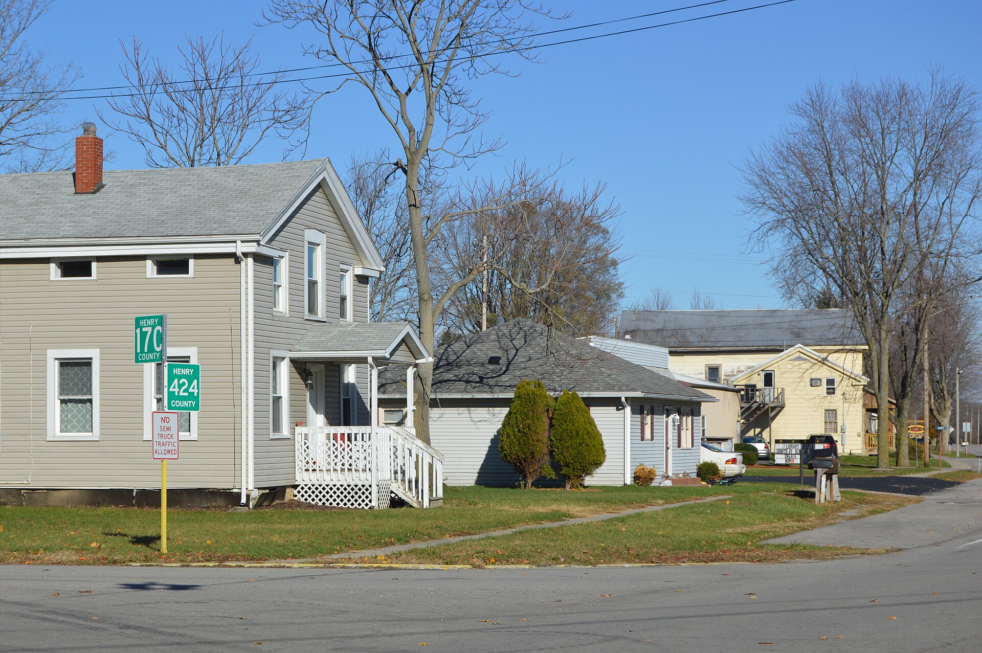 Houses on the northern side of High Street east of the Henry Street intersection in Florida, Ohio, United States.