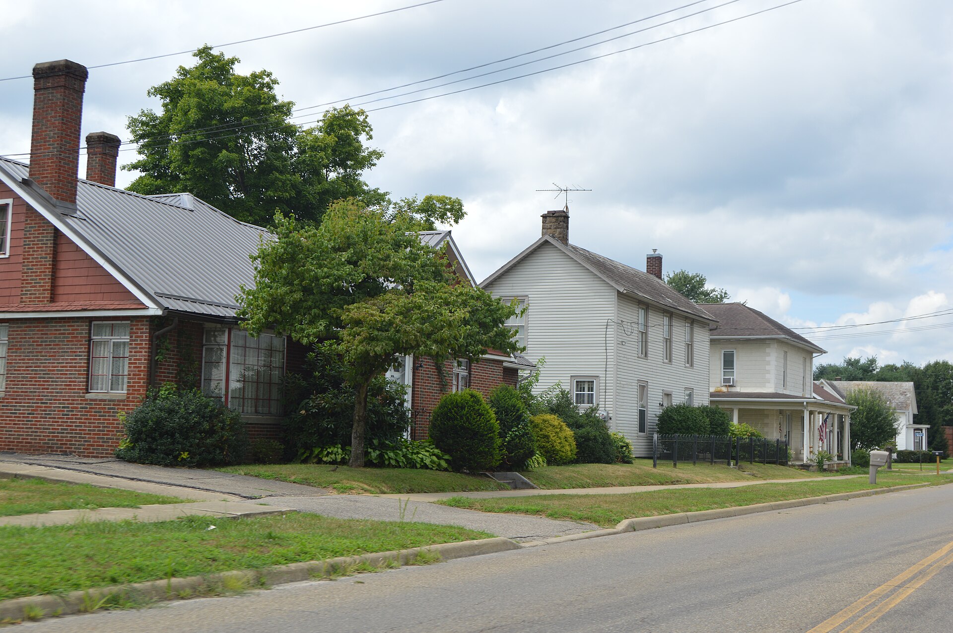 Houses on the southern side of Third Street west of State Street in Frazeysburg, Ohio, United States.