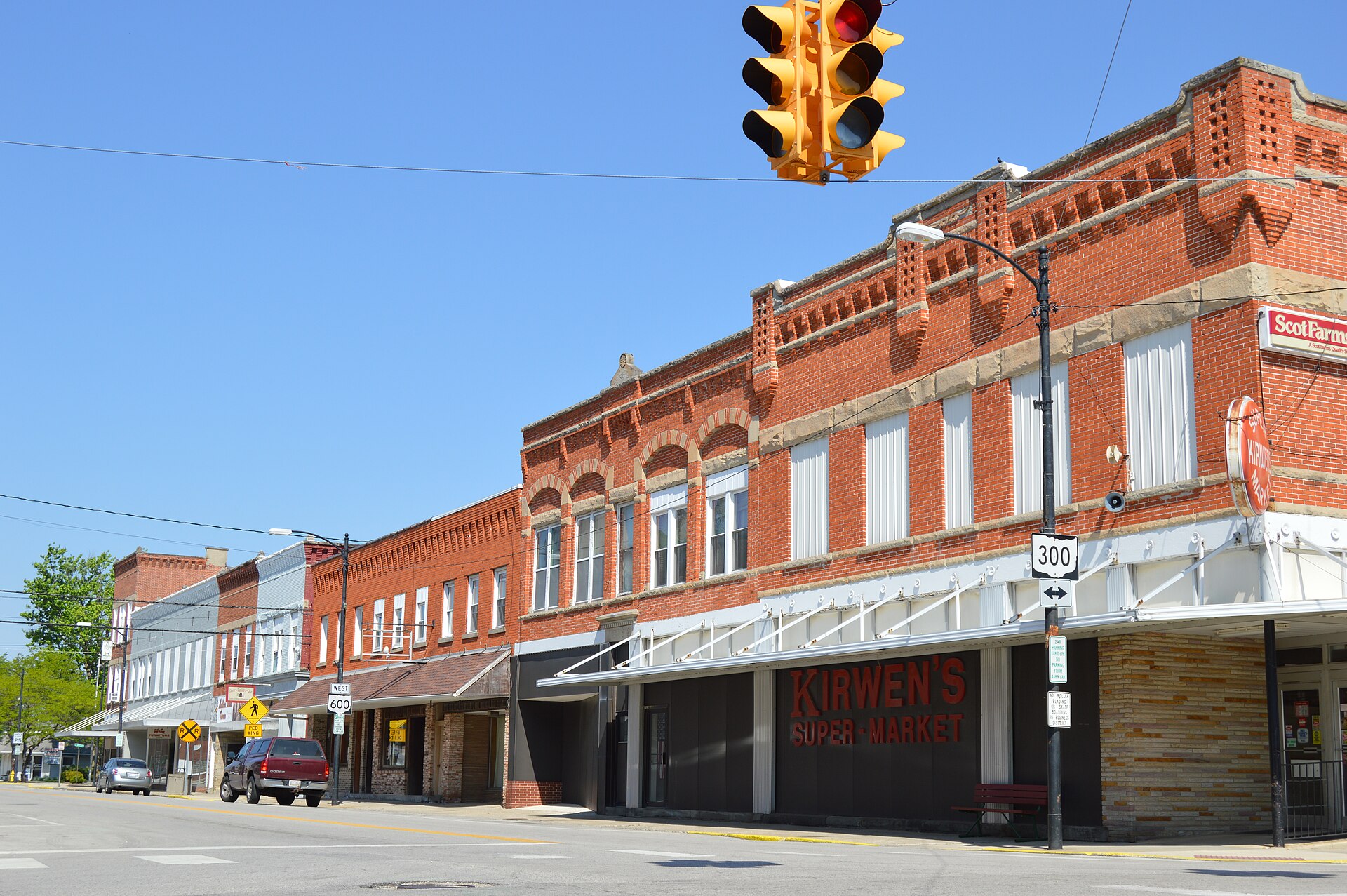 Buildings on the northern side of Madison Street (State Route 600) looking west from Main Street (State Route 300) in downtown Gibsonburg, Ohio, United States.