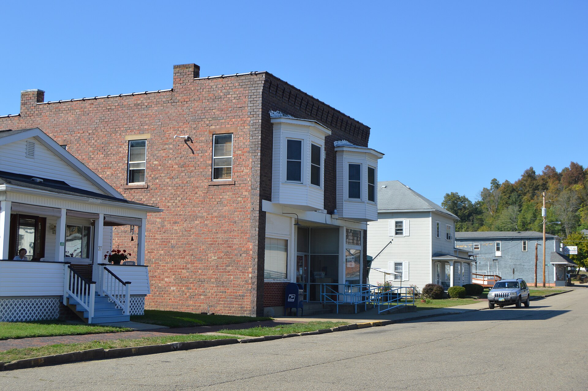Buildings on the western side of Sixth Street, south of Main Street, in Jacksonville, Ohio, United States.