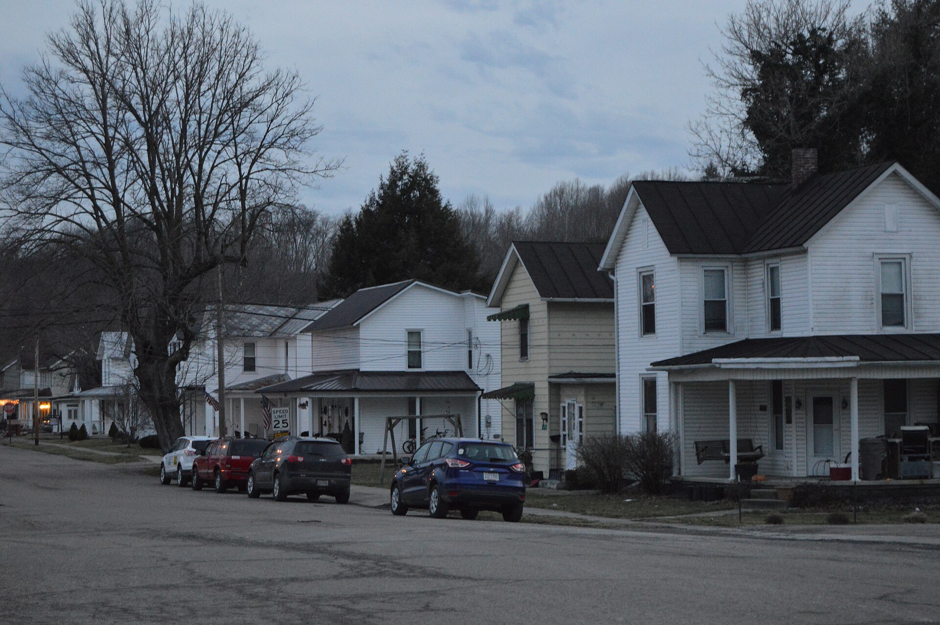 Houses on the western side of Main Street, looking south from the Maple Street intersection, in Laurelville, Ohio, United States.
