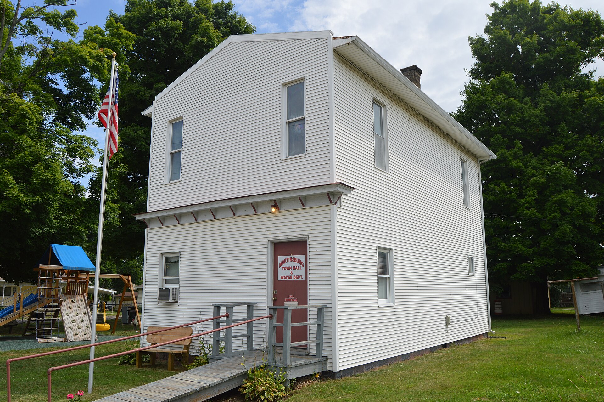 Front and southern side of the village hall in Martinsburg, Ohio, United States, located on Market Street (U.S. Route 62) just south of Pleasant Street.