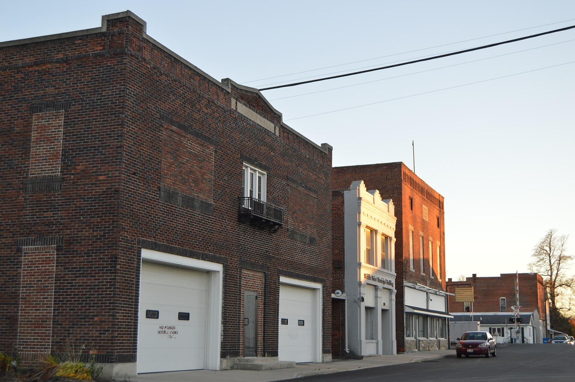Buildings on the eastern side of the 100 block of N. Adams Street in Middle Point, Ohio, United States.