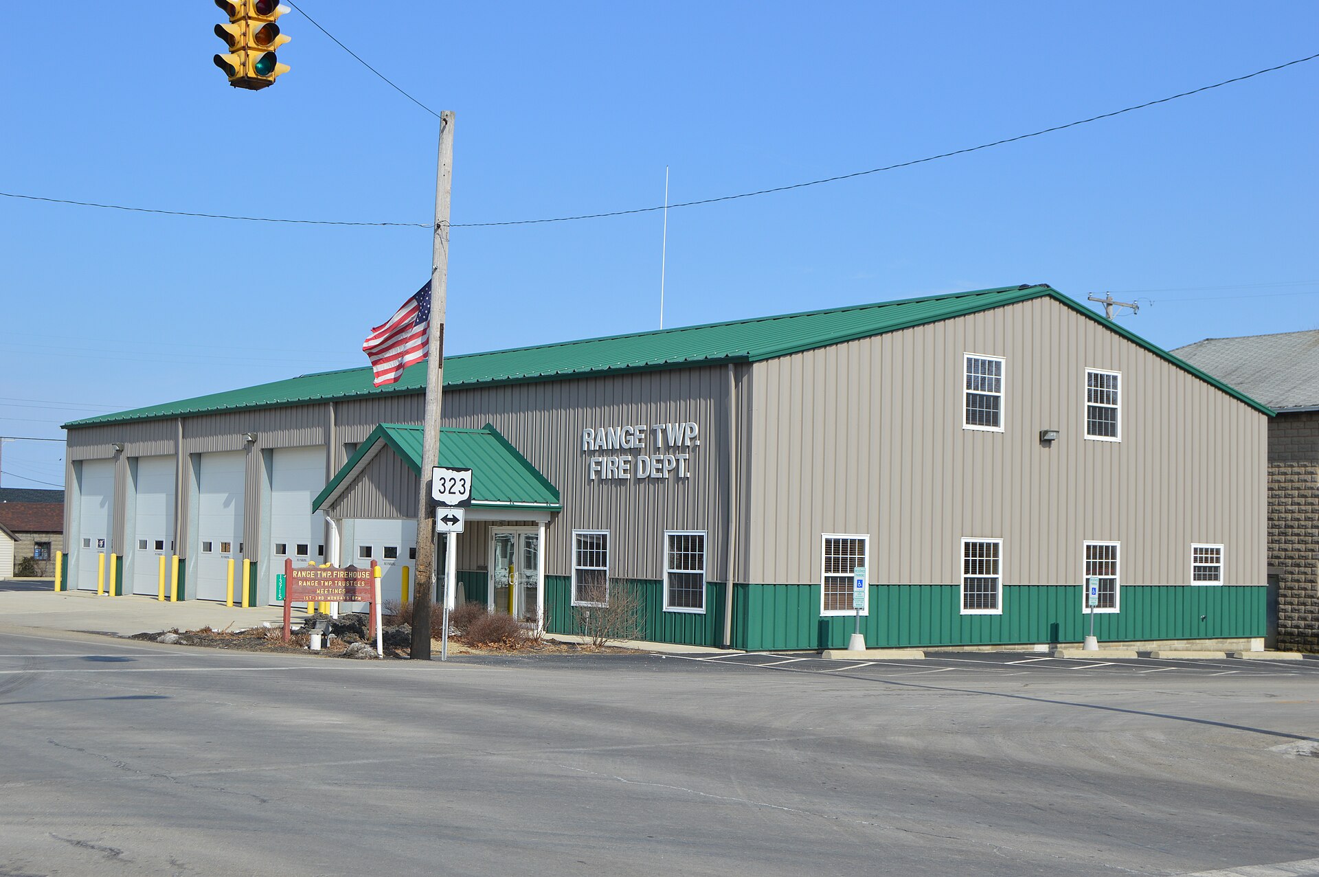 Front and southern side of the Range Township fire department, located on the northeastern corner of the junction of Main (State Route 38) and Federal (State Route 323) Streets in Midway, Ohio, United States.