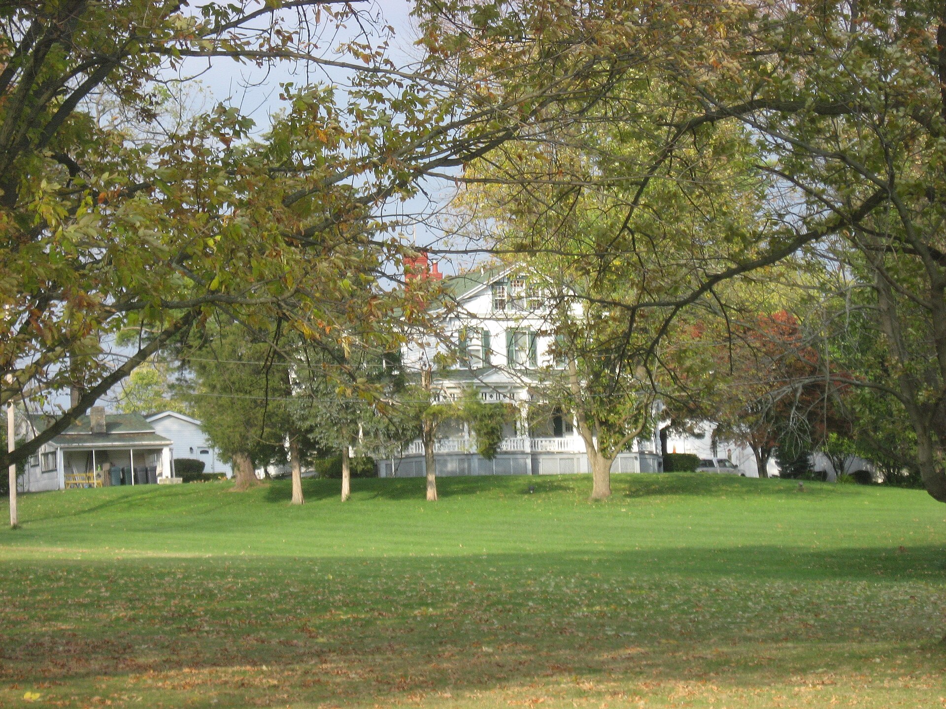Front of Hughes Manor, located at 5894 Hamilton-Lebanon Road in Monroe, Ohio, United States. Built in 1889, it is listed on the National Register of Historic Places.