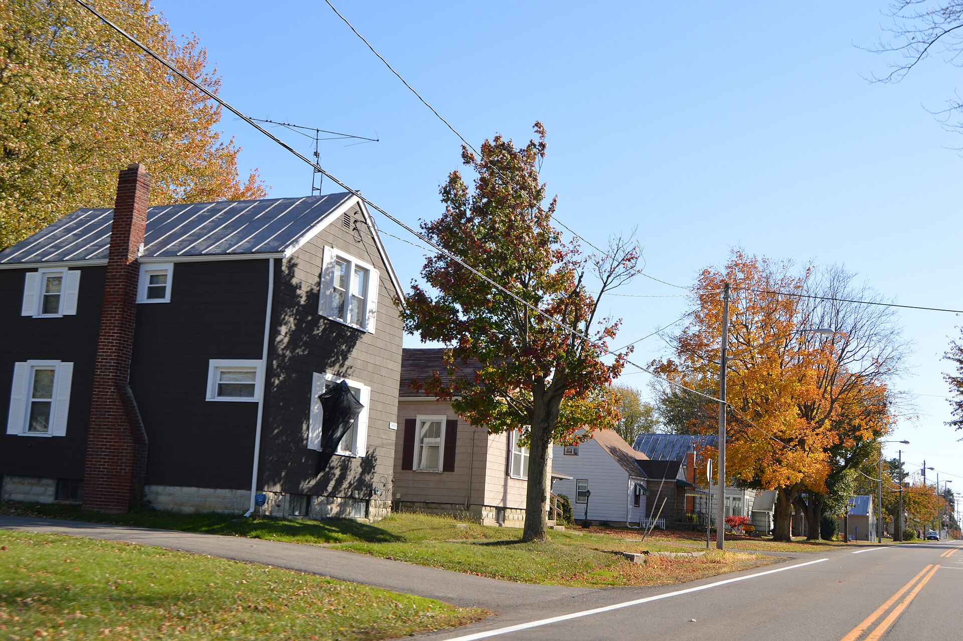 Houses on the eastern side of Main Street (State Route 602) south of the Caskey Street intersection in North Robinson, Ohio, United States.
