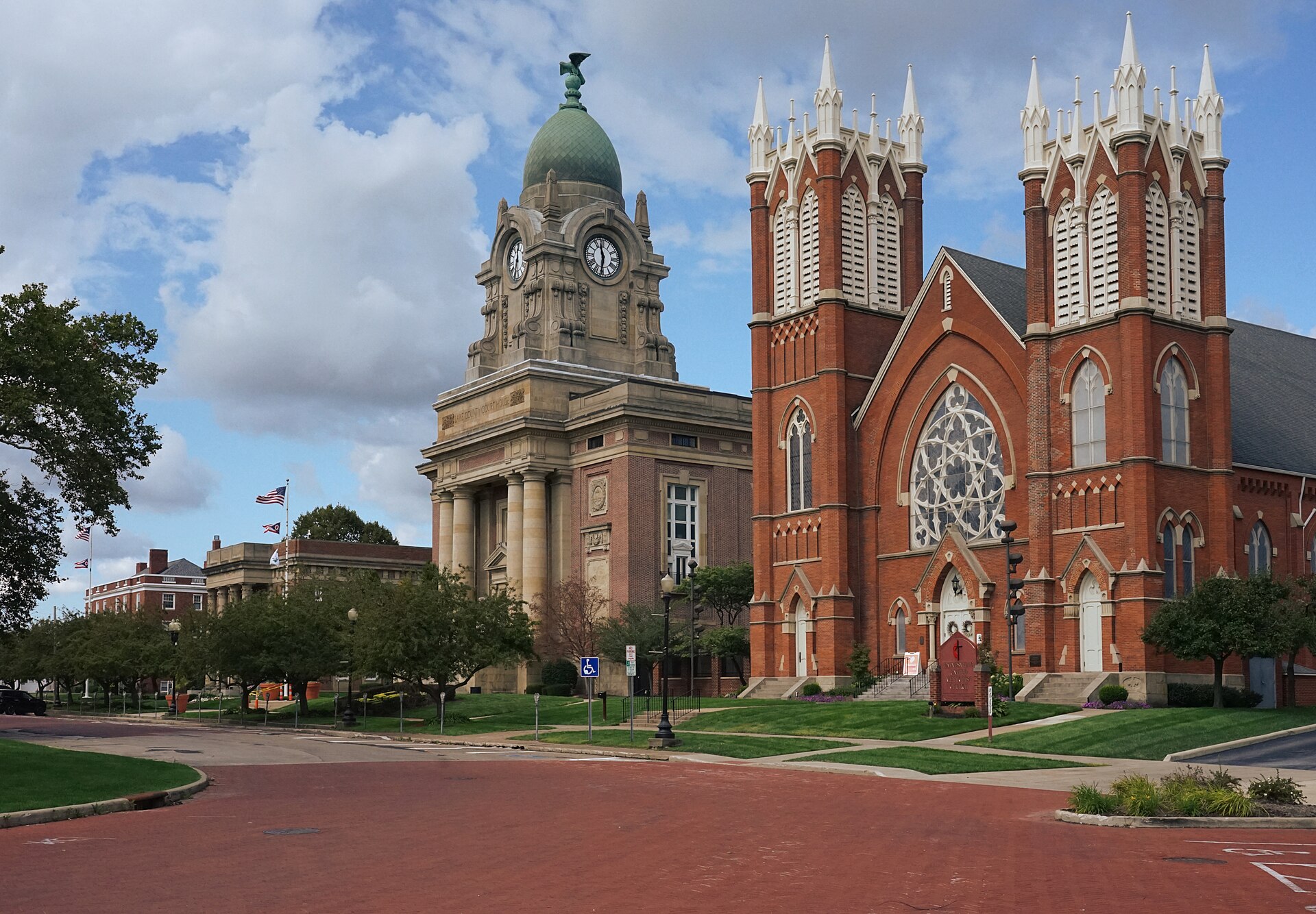 North Park Place in Painesville, Ohio. From left to right is the Methodist Episcopal Church of Painesville and the Lake County Courthouse. Within the Downtown Painesville Historic District.