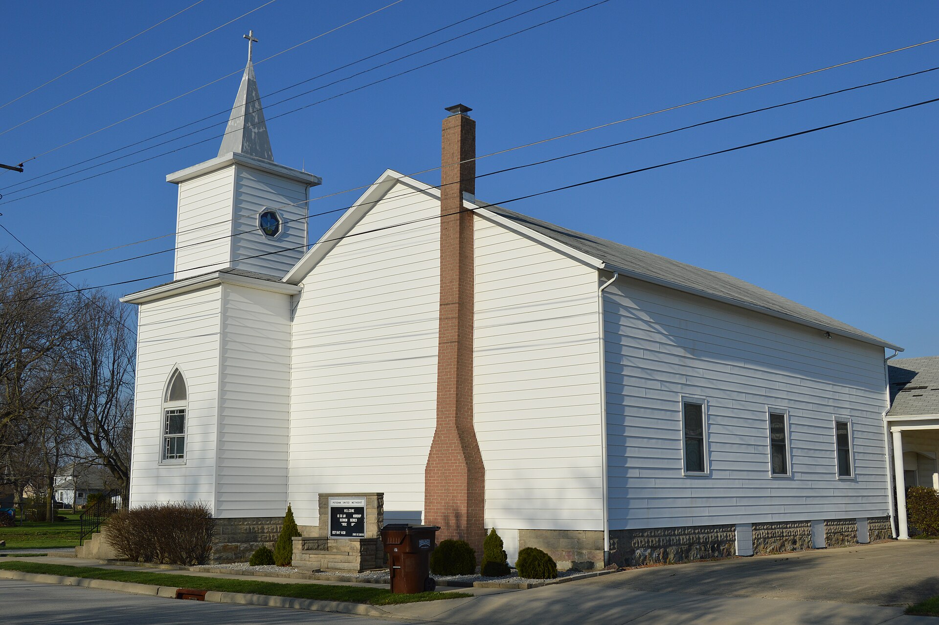 Front and southern side of the Potsdam United Methodist Church, located at 12 S. Main Street (State Route 721) in Potsdam, Ohio, United States.