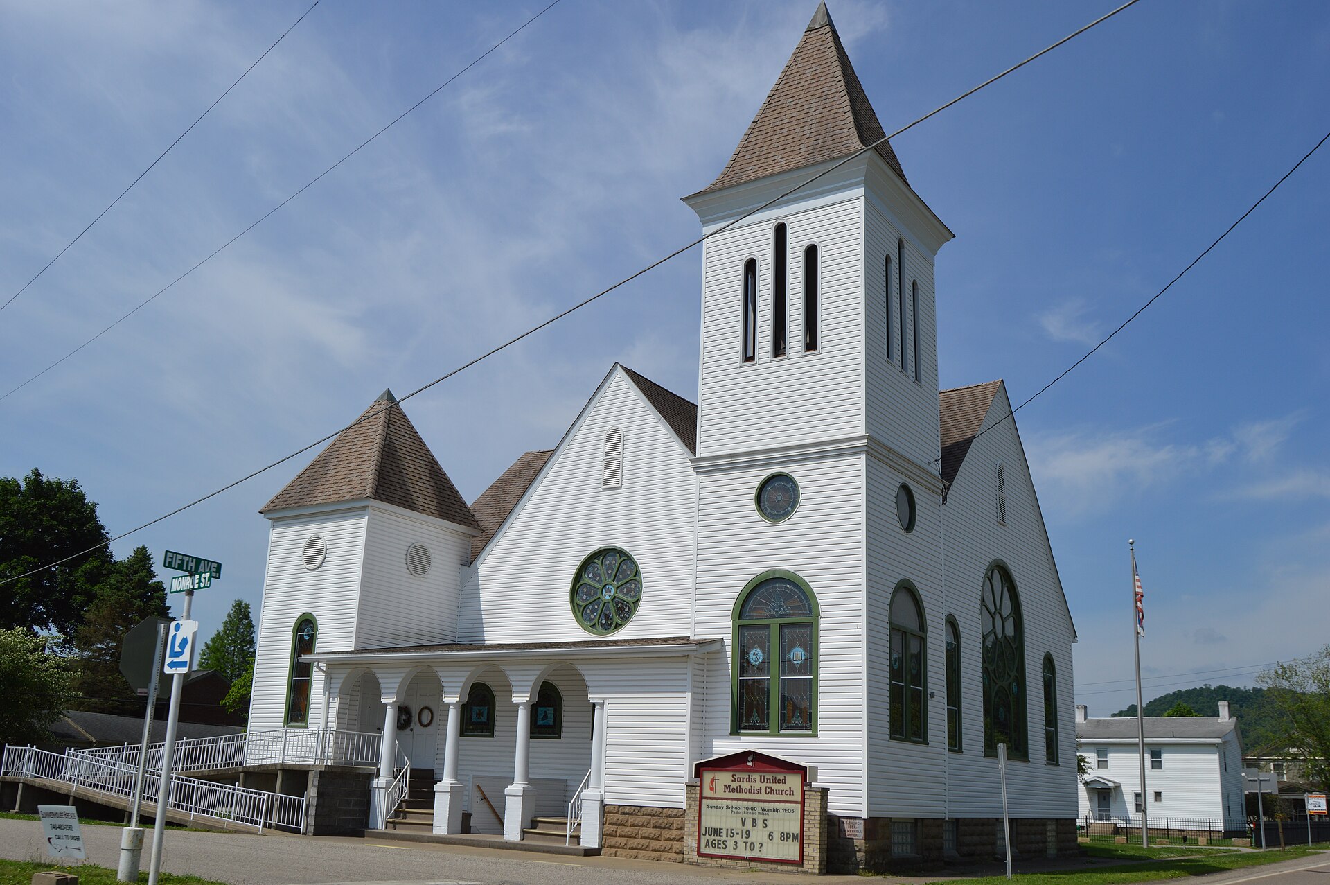 Front and northern side of the Sardis United Methodist Church, located at the junction of Fifth Avenue (State Route 7) and Monroe Street in Sardis, Ohio, United States.