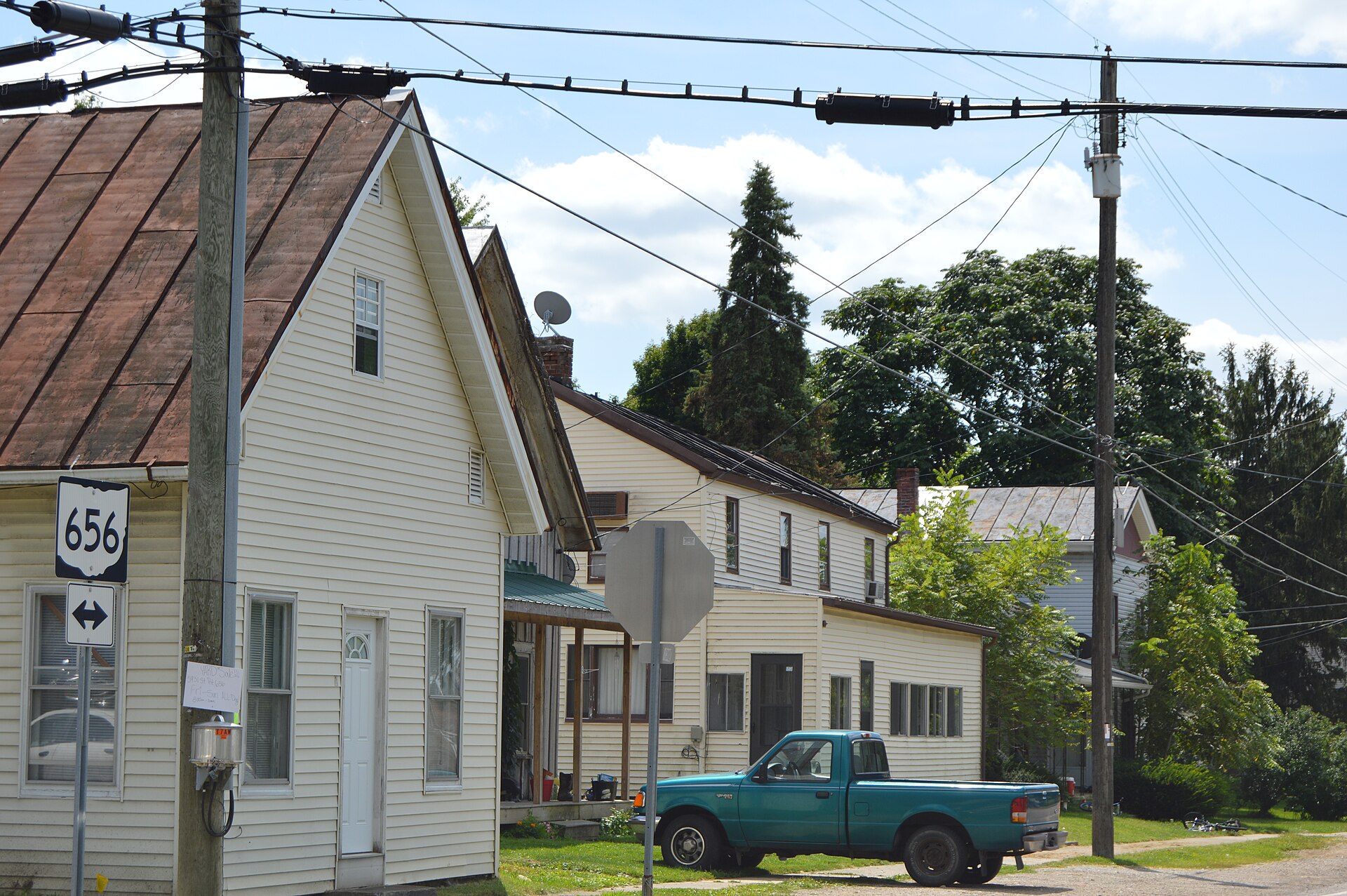 Houses on the southeastern side of Main Street (State Route 656) southwest of the Church Street intersection in Sparta, Ohio, United States.