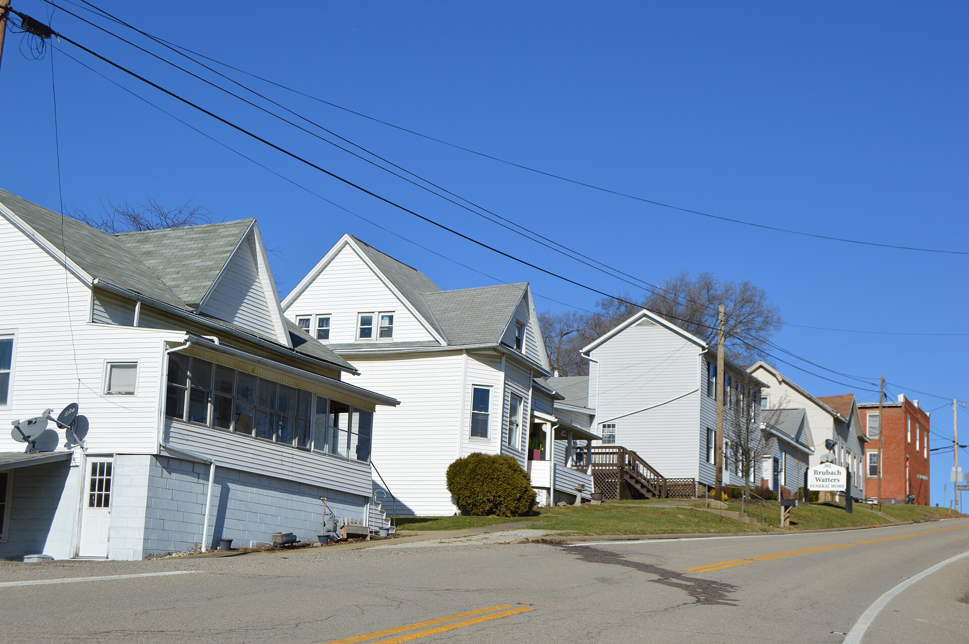Houses on the western side of Main Street (State Route 146) on the southern edge of Summerfield, Ohio, United States.
