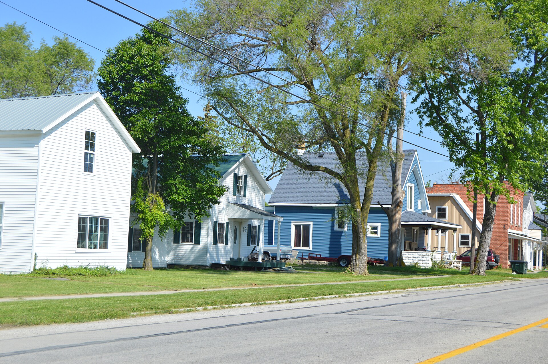 Houses on the western side of State Route 199 in southern West Millgrove, Ohio, United States.