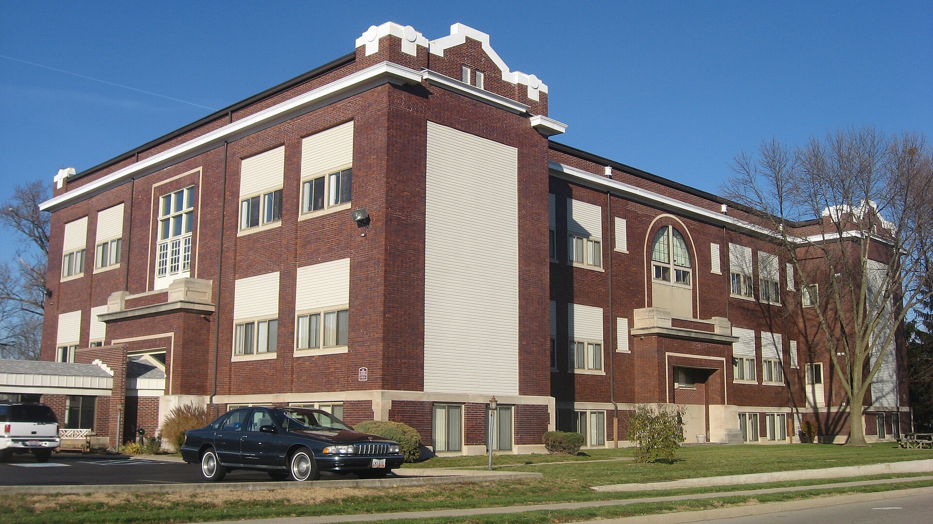 Southern side and front of the McKinley School, located at 240 S. Main Street in West Milton, Ohio, United States. Built in 1909, it is listed on the National Register of Historic Places.