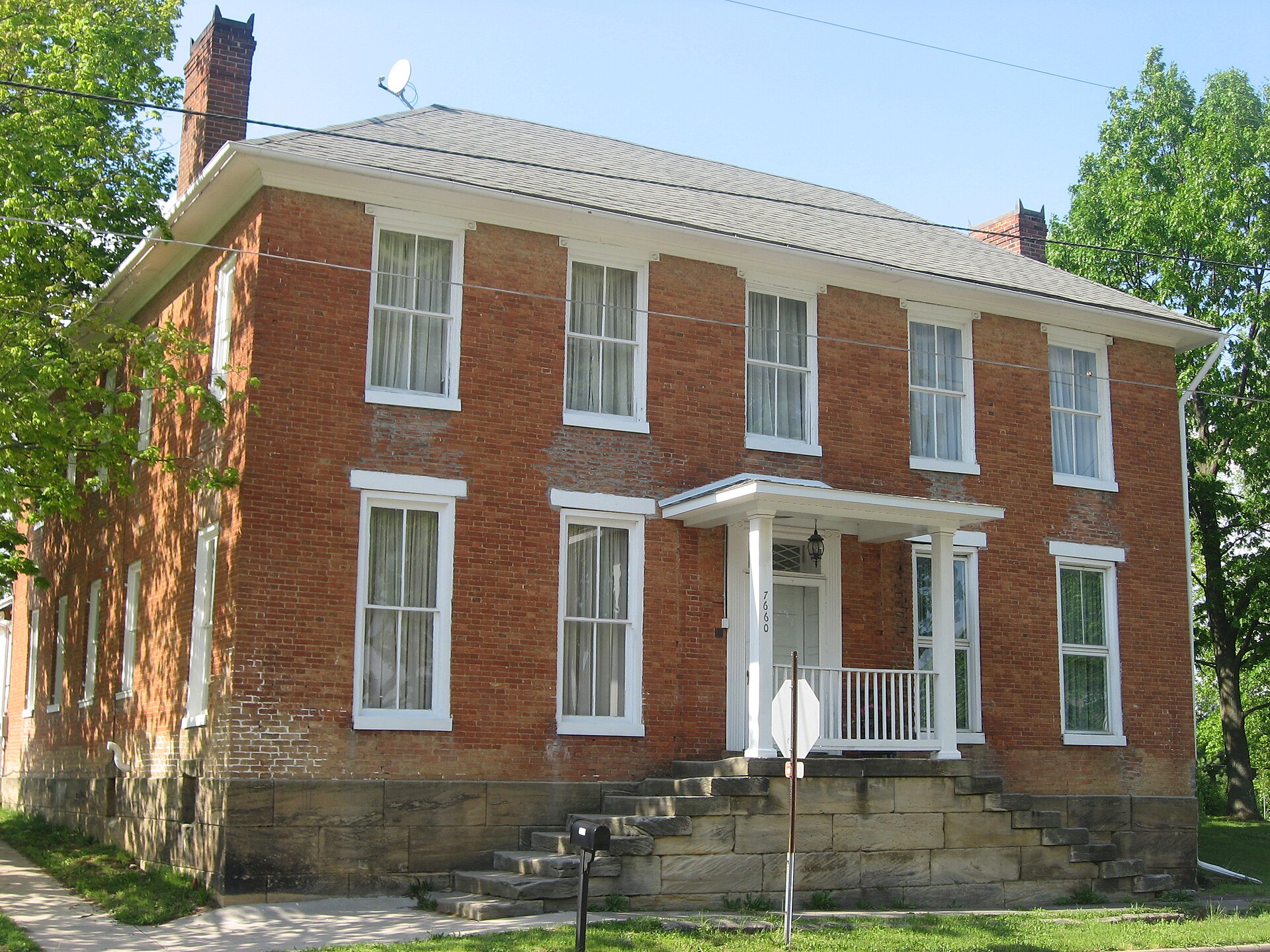 Front and western side of the Joseph Ijams House, located at 7660 Main Street in West Rushville, Ohio, United States. Built in 1810, it is listed on the National Register of Historic Places.