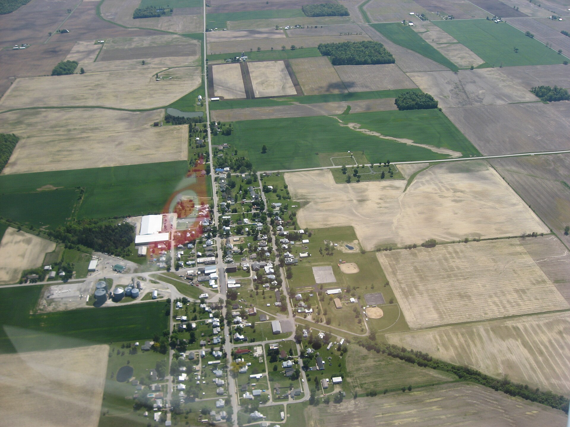 Aerial view of Wharton, a village in Wyandot County, Ohio, United States. Picture taken from a Diamond Eclipse light airplane at an altitude of 3,500 feet MSL and a bearing of approximately 100º.
