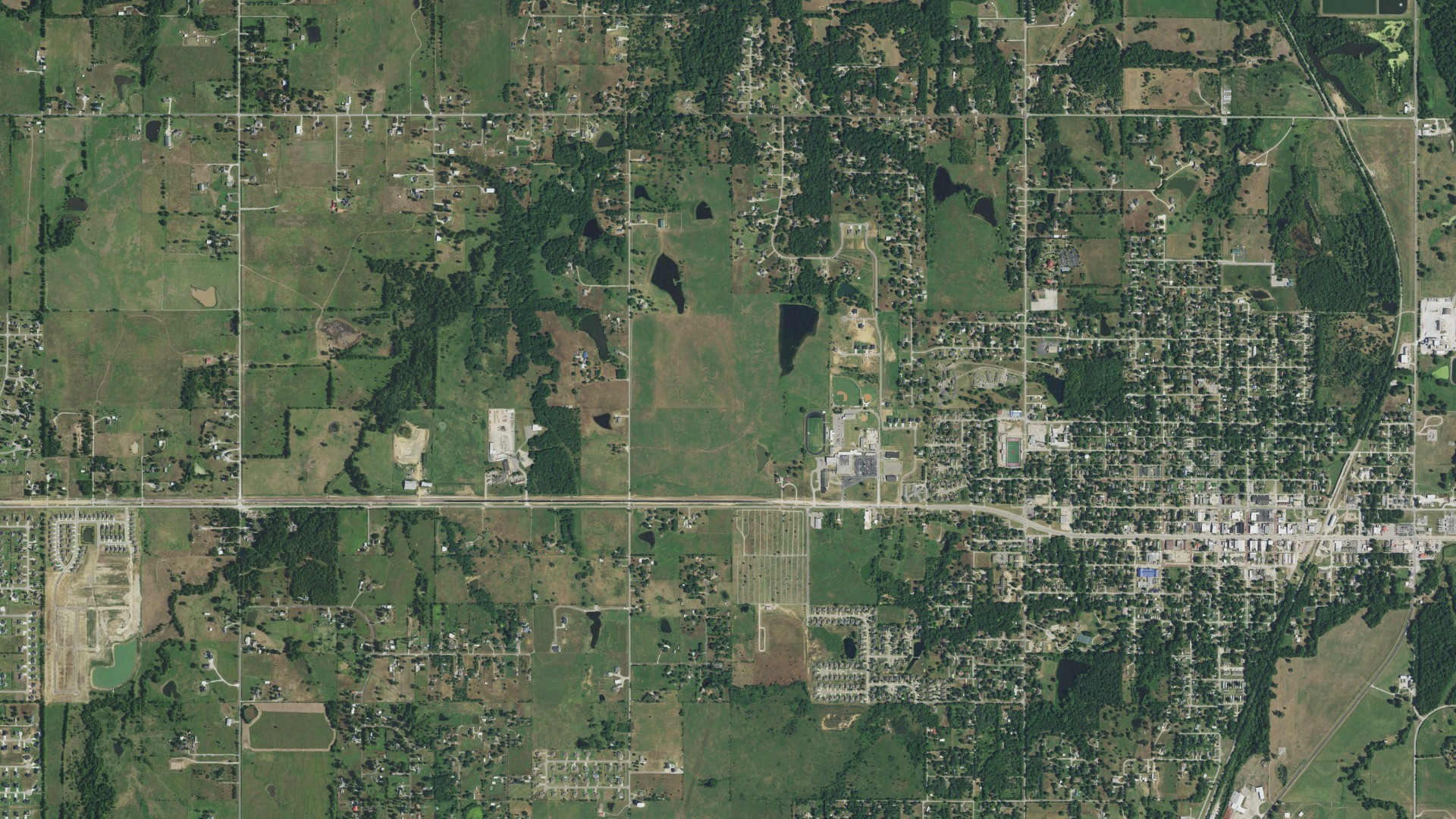 Natural-color aerial photograph of land around Collinsville, Oklahoma
