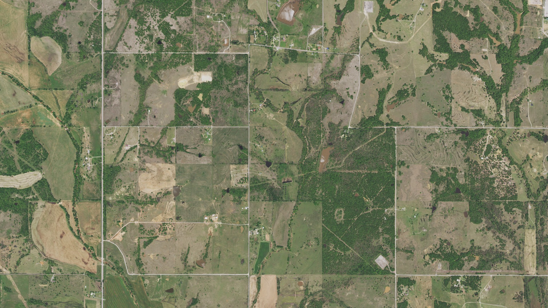 Natural-color aerial photograph of land around Foster, Oklahoma
