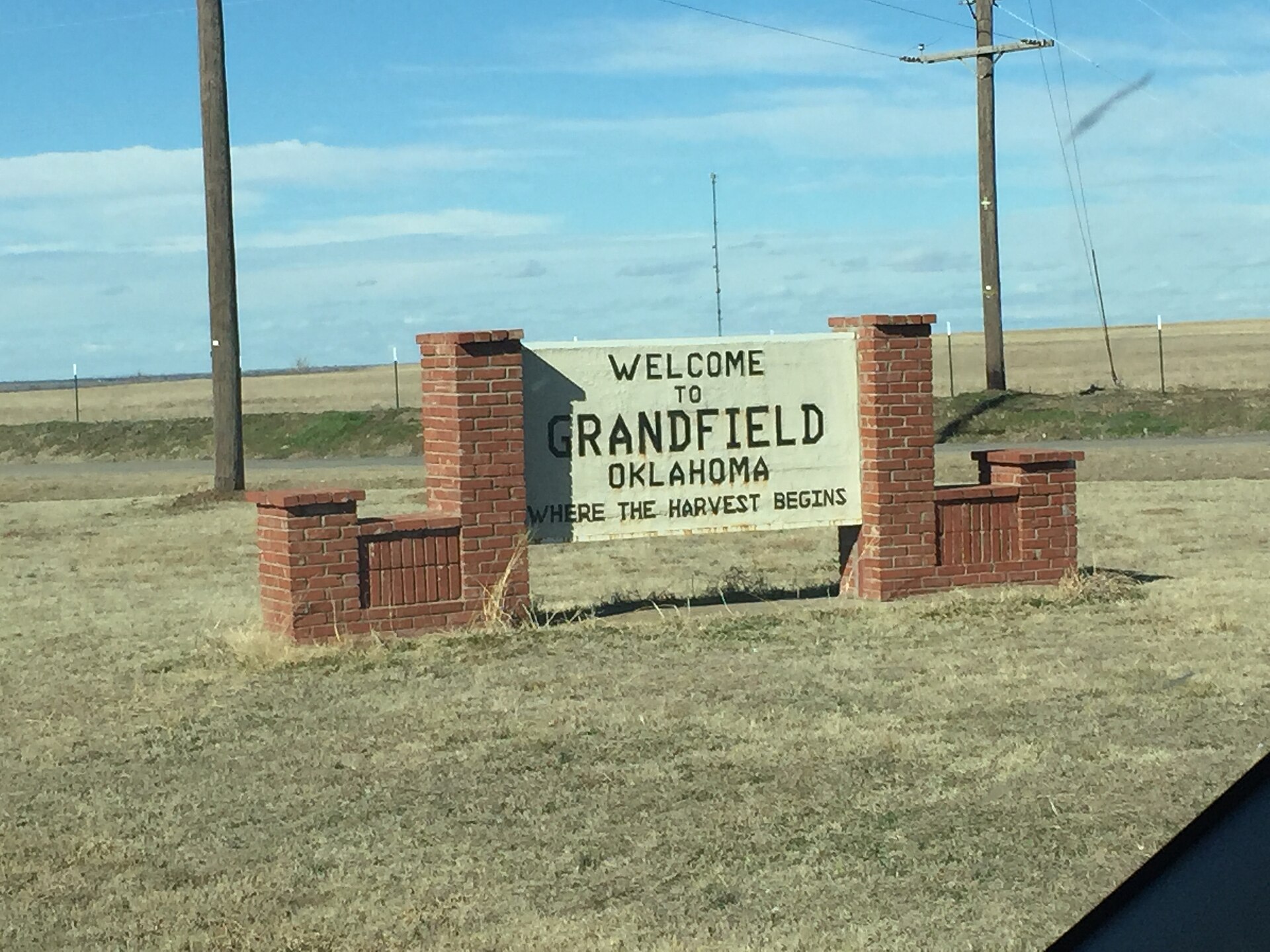Photograph of a welcome sign on the eastern edge of Grandfield in January 2016. — Oklahoma