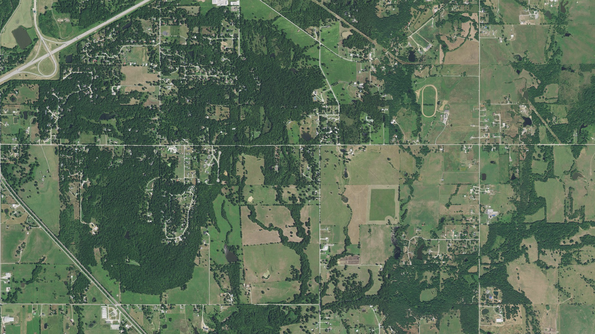 Natural-color aerial photograph of land around Justice, Oklahoma