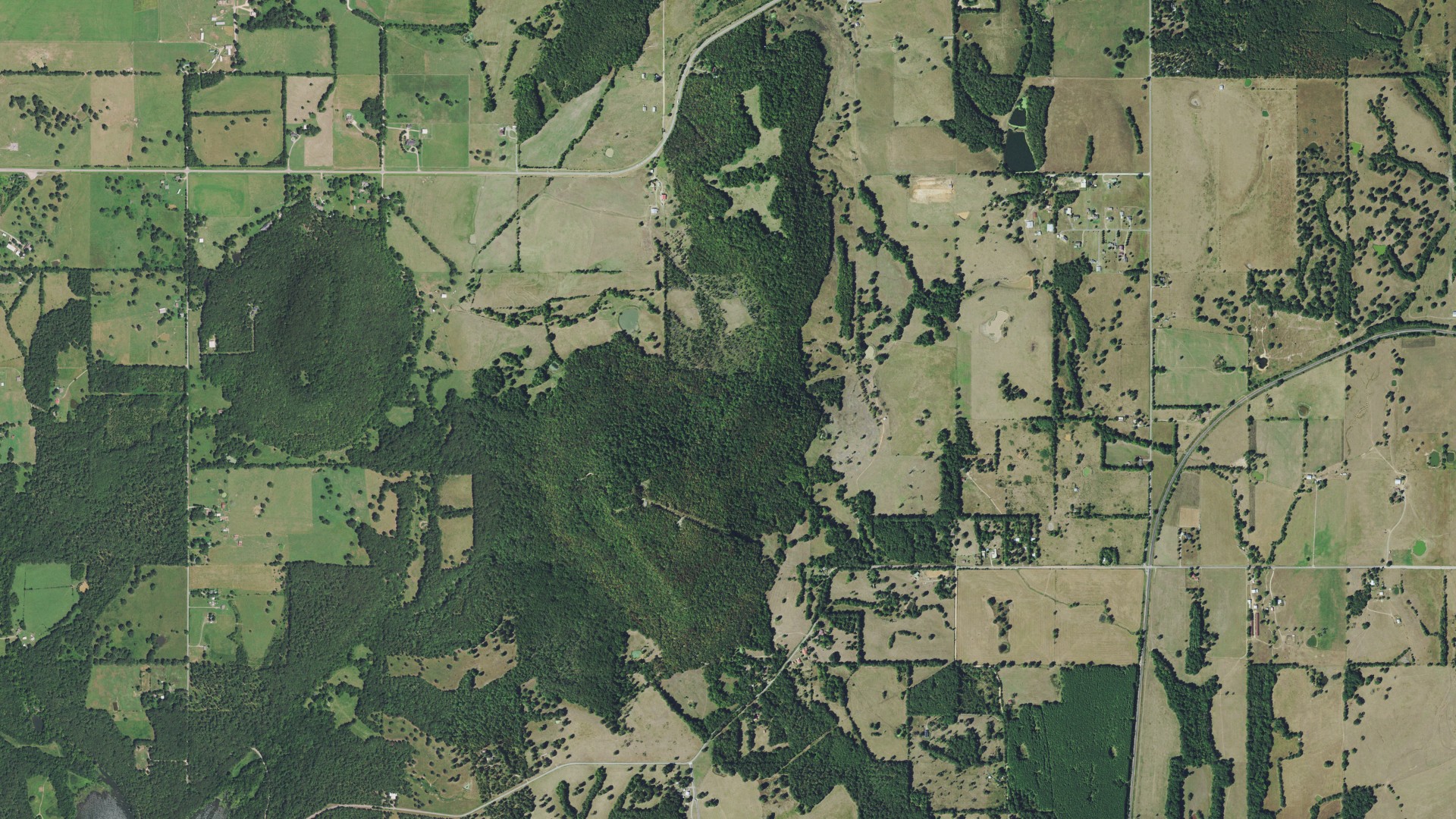 Natural-color aerial photograph of land around Lyons Switch, Oklahoma