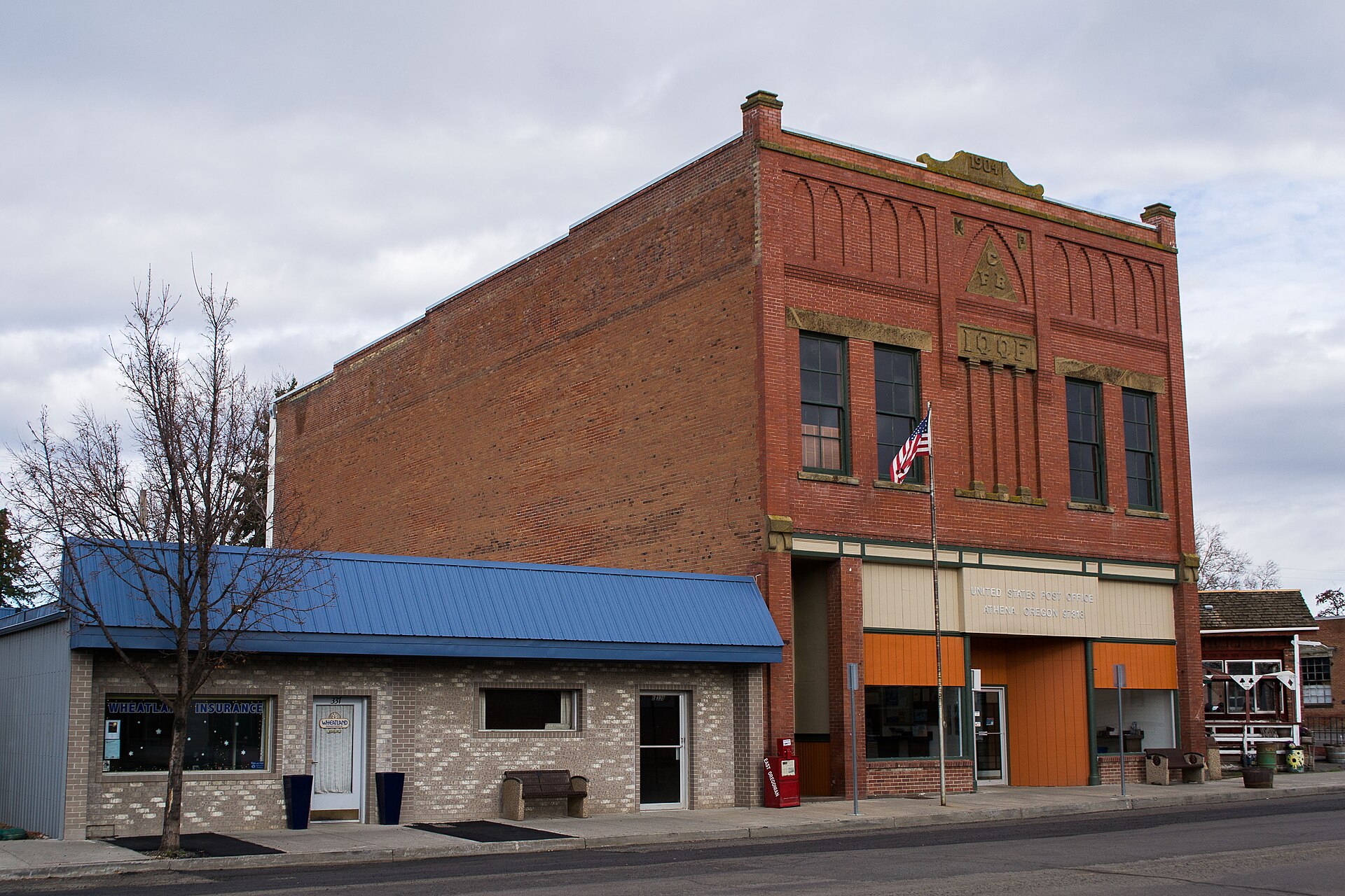 IOOF Building and post office. Designed by Pendleton architect T.F. Howard, built 1904 for both the Odd Fellows and the Knights of Pythias. The brick of the facade was made in Coffeyville, Kansas. — Athena, Oregon