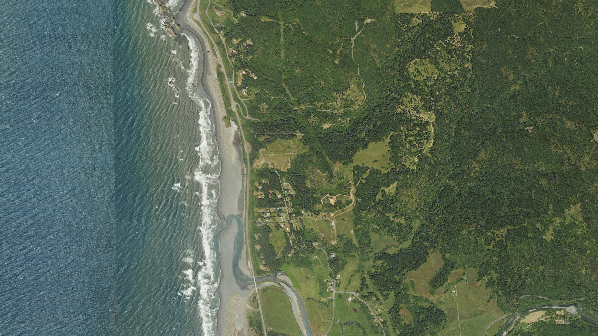 Natural-color aerial photograph of land around Pistol River, Oregon