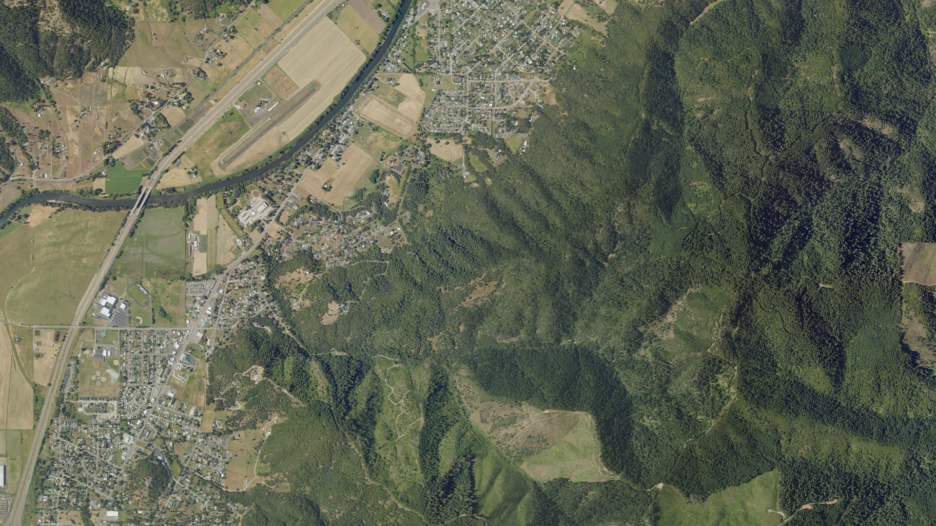Natural-color aerial photograph of land around Tri-City, Oregon