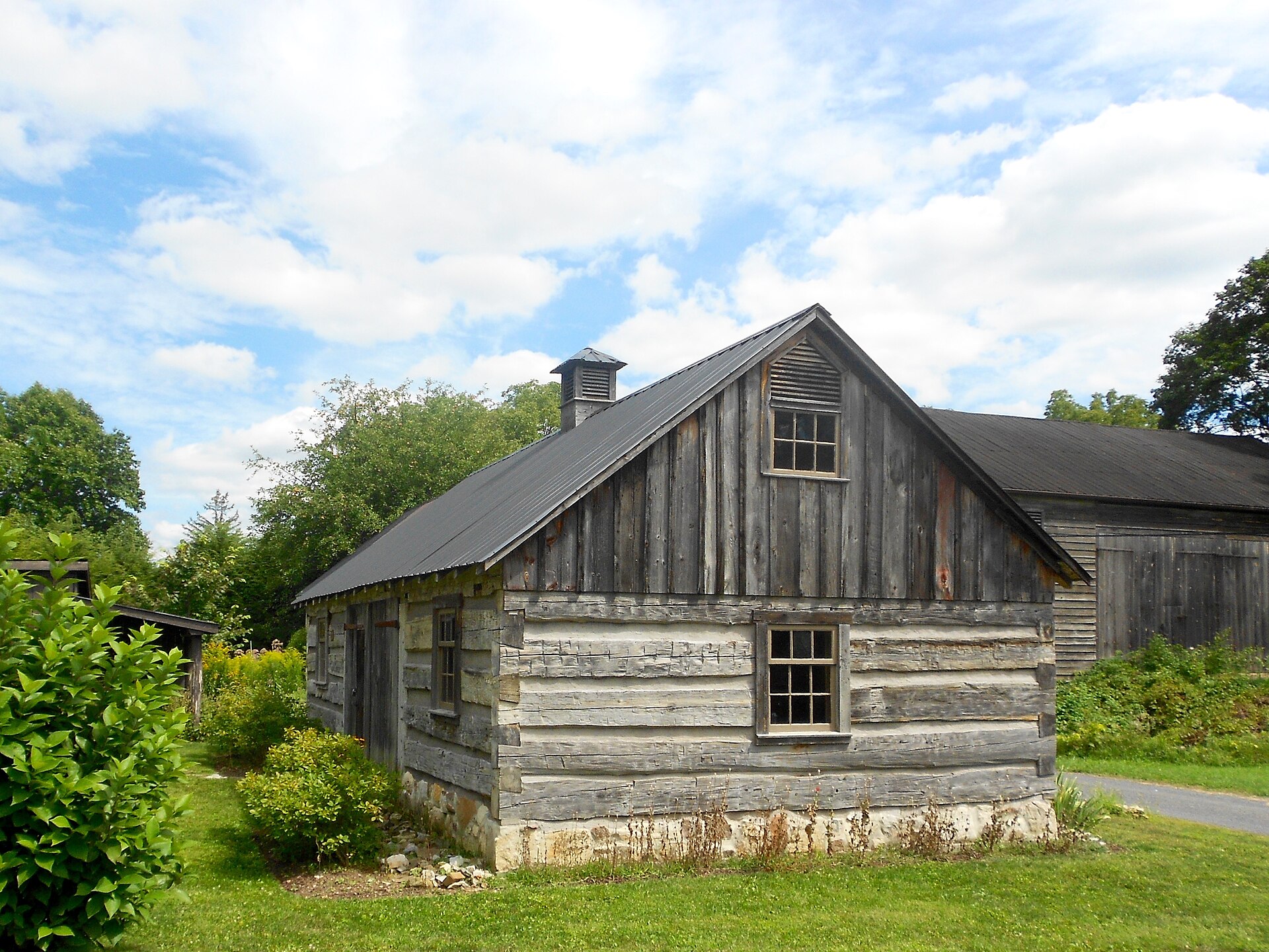 Log (not plank) house in the Aaronsburg Historic District, listed on the NRHP on September 2, 1980 (#80003452). — Pennsylvania