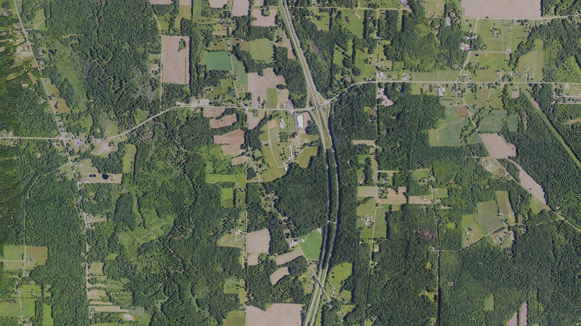 Natural-color aerial photograph of land around Hayfield, Pennsylvania