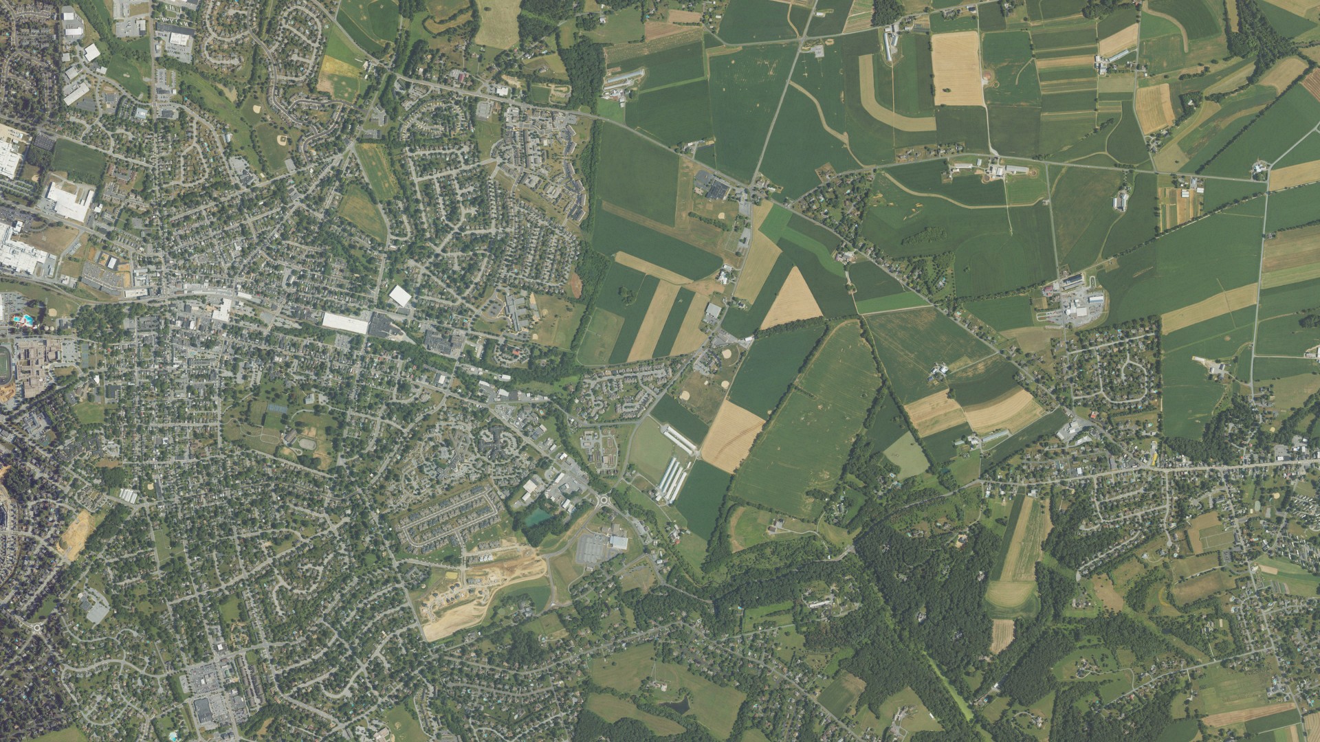 Natural-color aerial photograph of land around Warwick, Pennsylvania