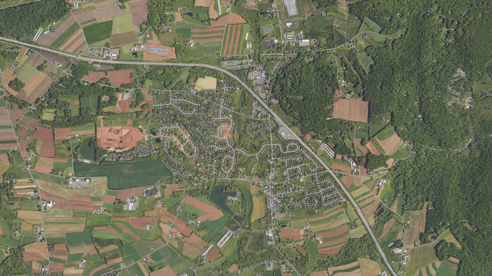 Natural-color aerial photograph of land around Bowmansville, Pennsylvania