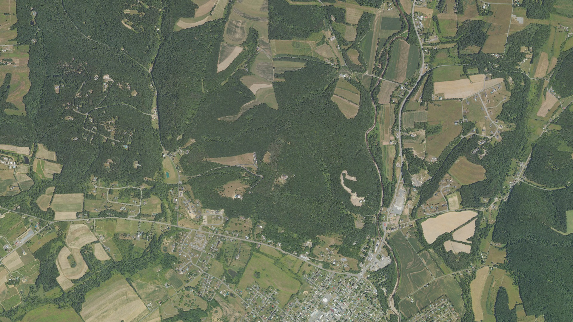Natural-color aerial photograph of land around Wolf, Pennsylvania