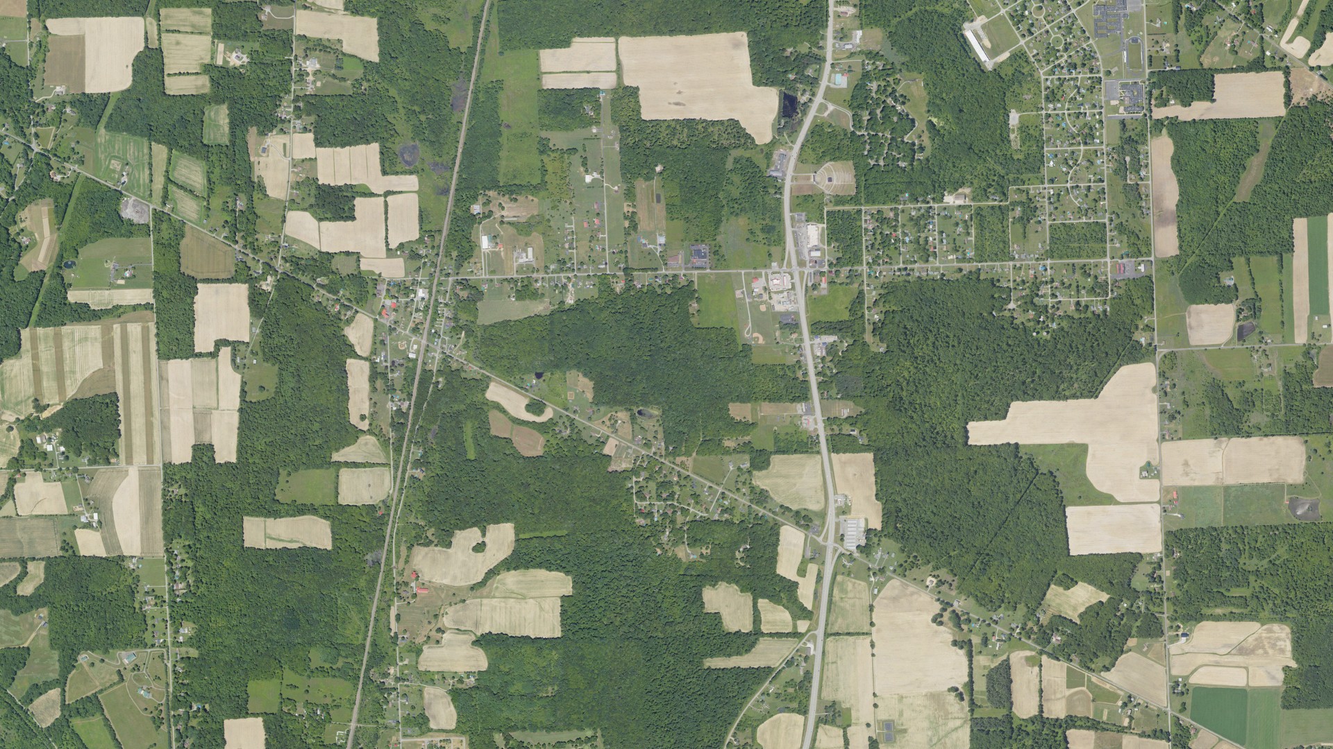 Natural-color aerial photograph of land around Pymatuning, Pennsylvania