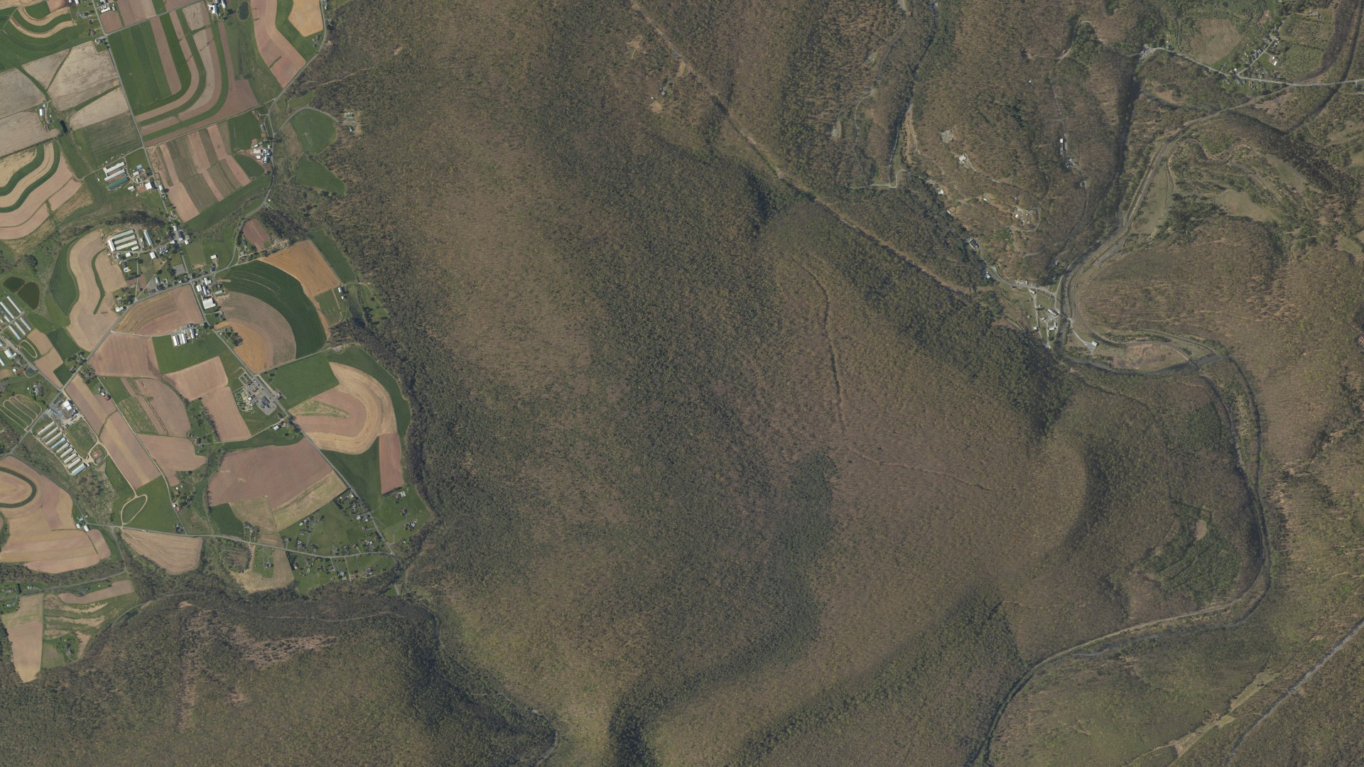 Natural-color aerial photograph of land around Walker, Pennsylvania