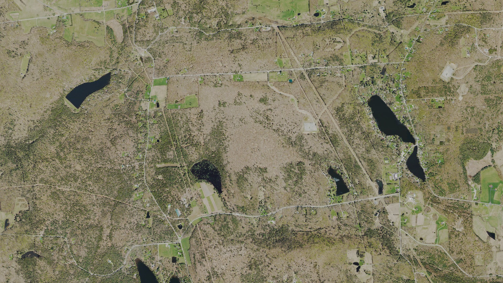 Natural-color aerial photograph of land around Silver Lake, Pennsylvania