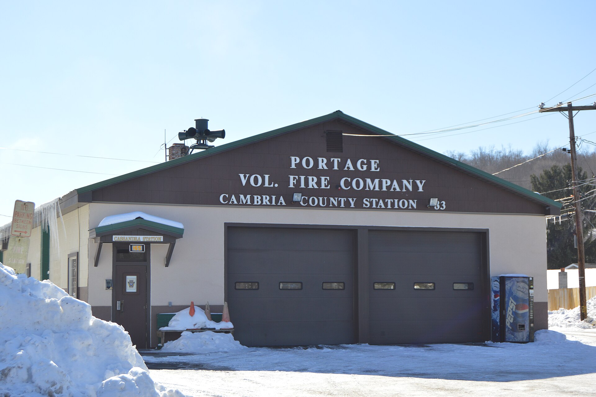Front and eastern side of the Portage Volunteer Fire Company fire hall, located on Main Street in Cassandra, Pennsylvania, United States.