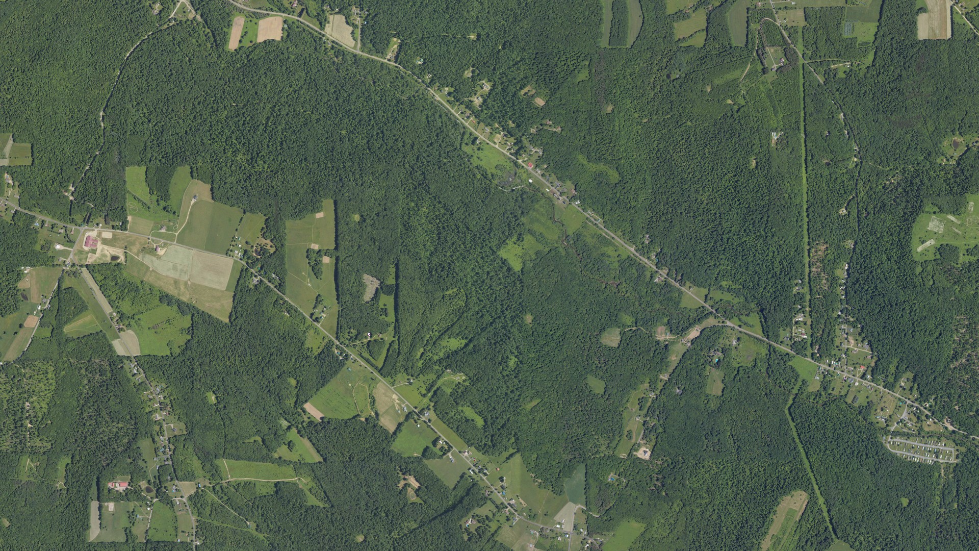 Natural-color aerial photograph of land around Conewango, Pennsylvania