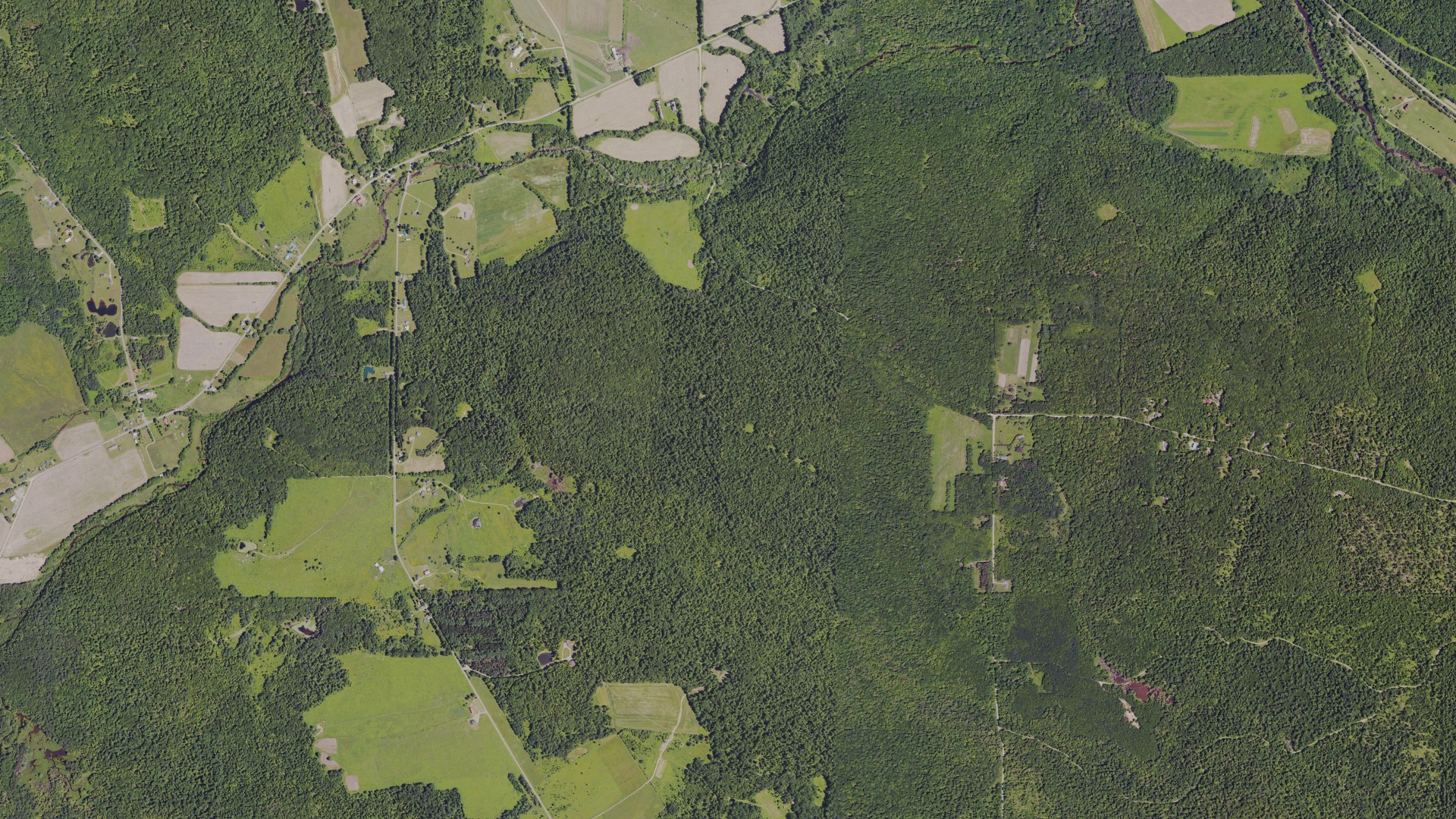 Natural-color aerial photograph of land around Spring Creek, Pennsylvania