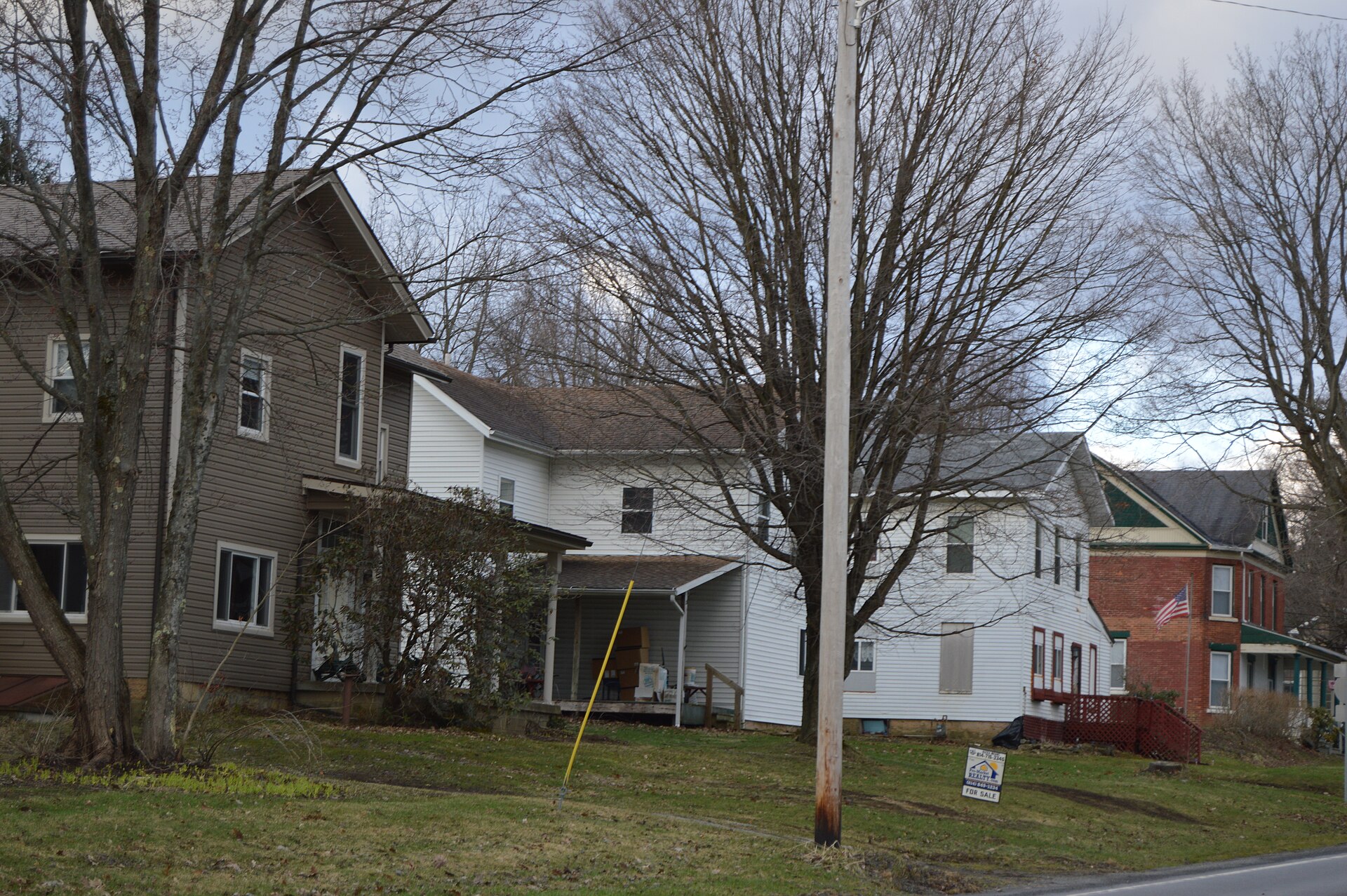 Houses on the southern side of Main Street (U.S. Route 322) east of the Church Street intersection in Corsica, Pennsylvania, United States.