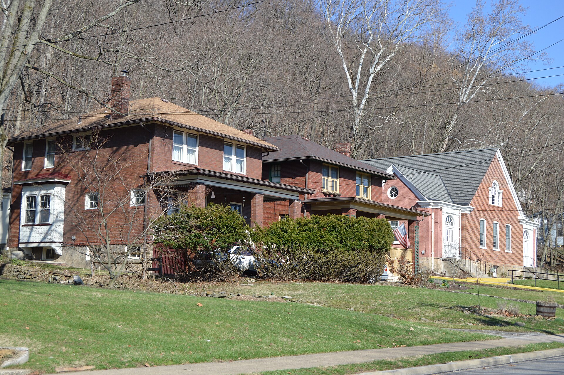 Houses and Grace Orthodox Presbyterian Church on the northern side of the 1400 block of Beaver Street in Glen Osborne, Pennsylvania, United States.