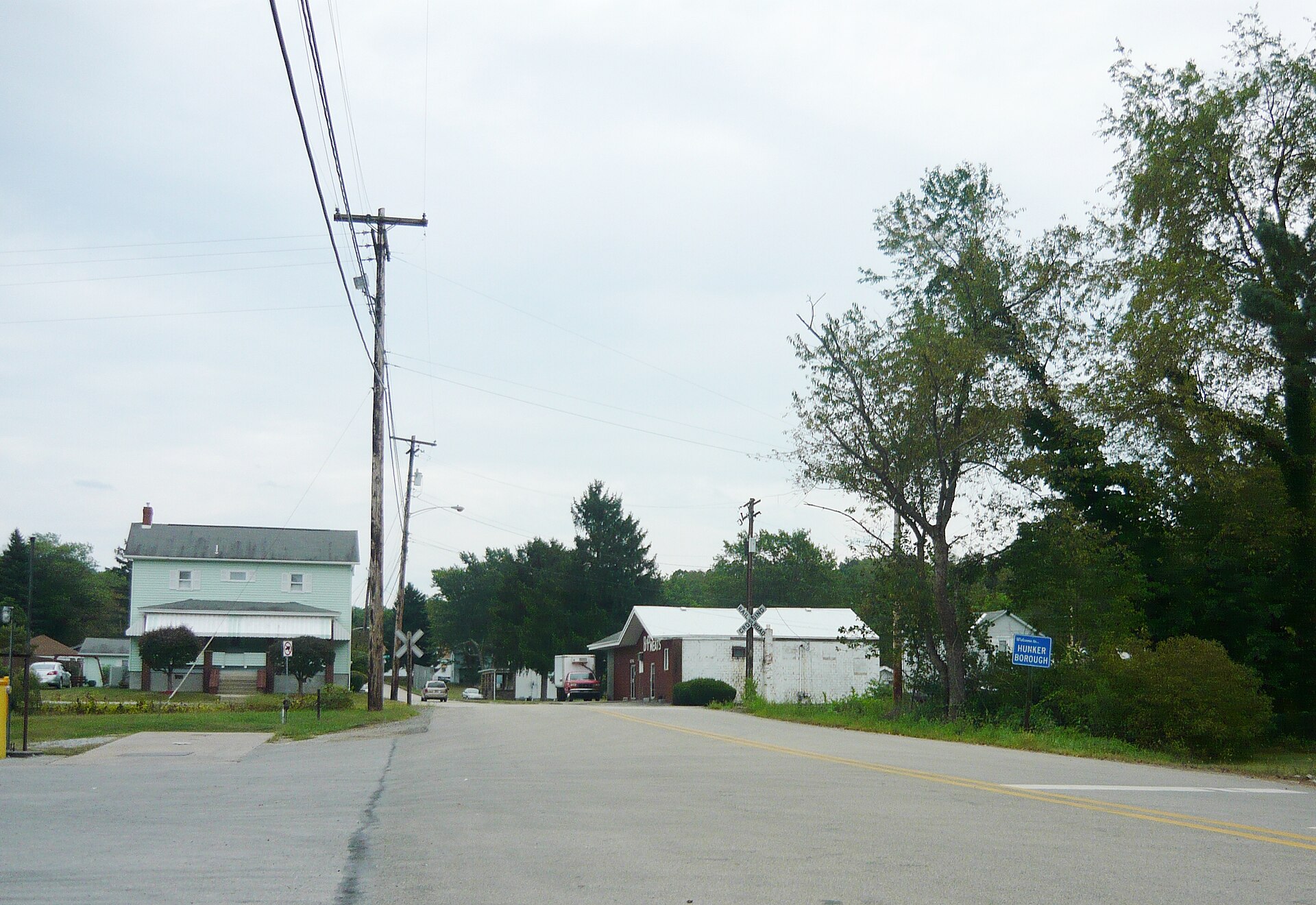 Looking toward the southeast on Bridge Street, just outside the borough boundary. (Note boundary sign at right.) Borough of Hunker, Westmoreland County, Pennsylvania.