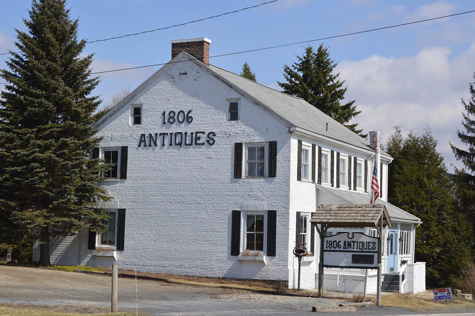 Western end and front of the John Dennison House, a former tavern on the Pennsylvania Wagon Road in Jennerstown, Pennsylvania, United States.