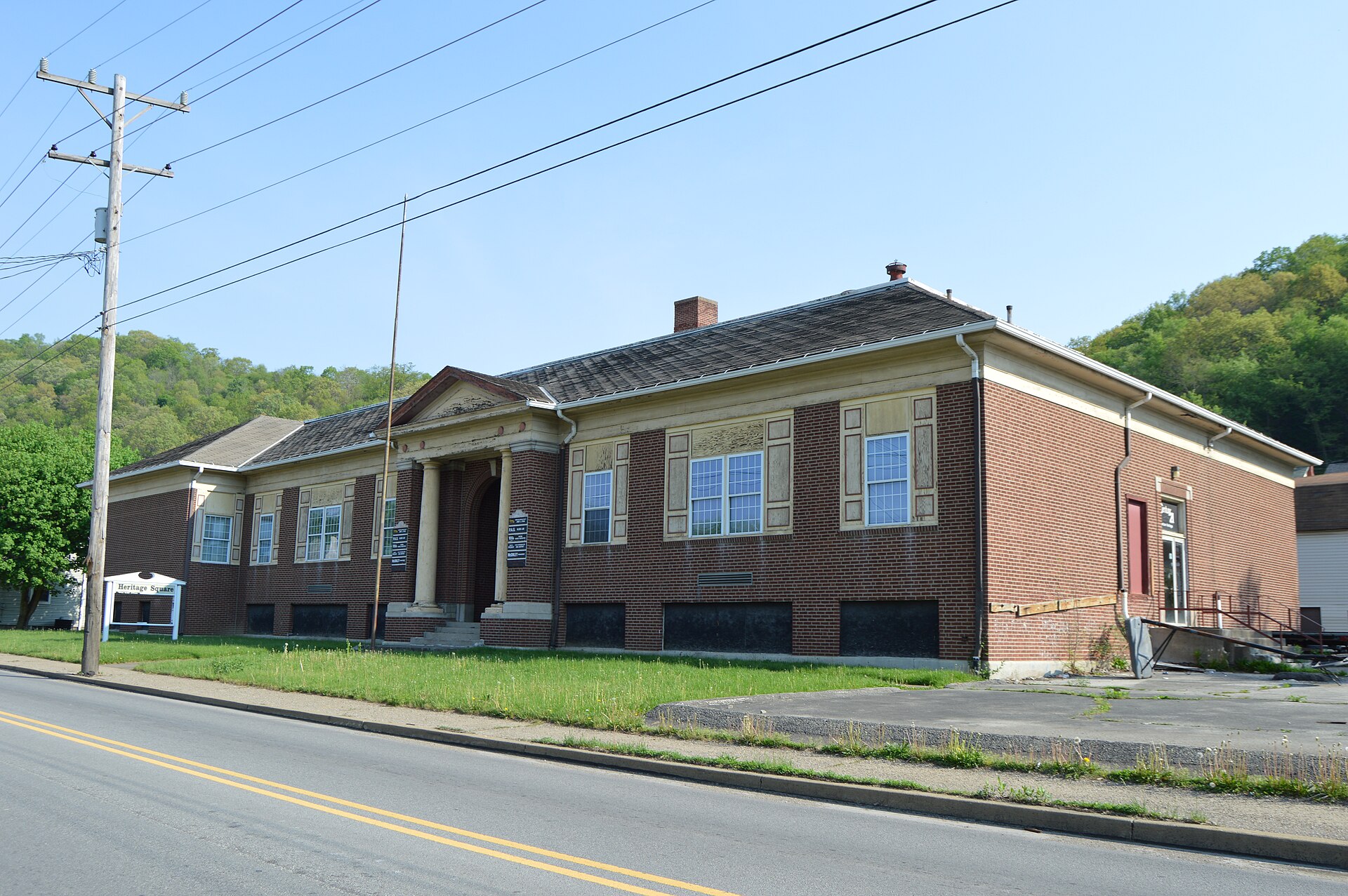 An office building (a former school?) at 170 Lincoln Street (Pennsylvania Route 66) in North Vandergrift, Pennsylvania, United States.