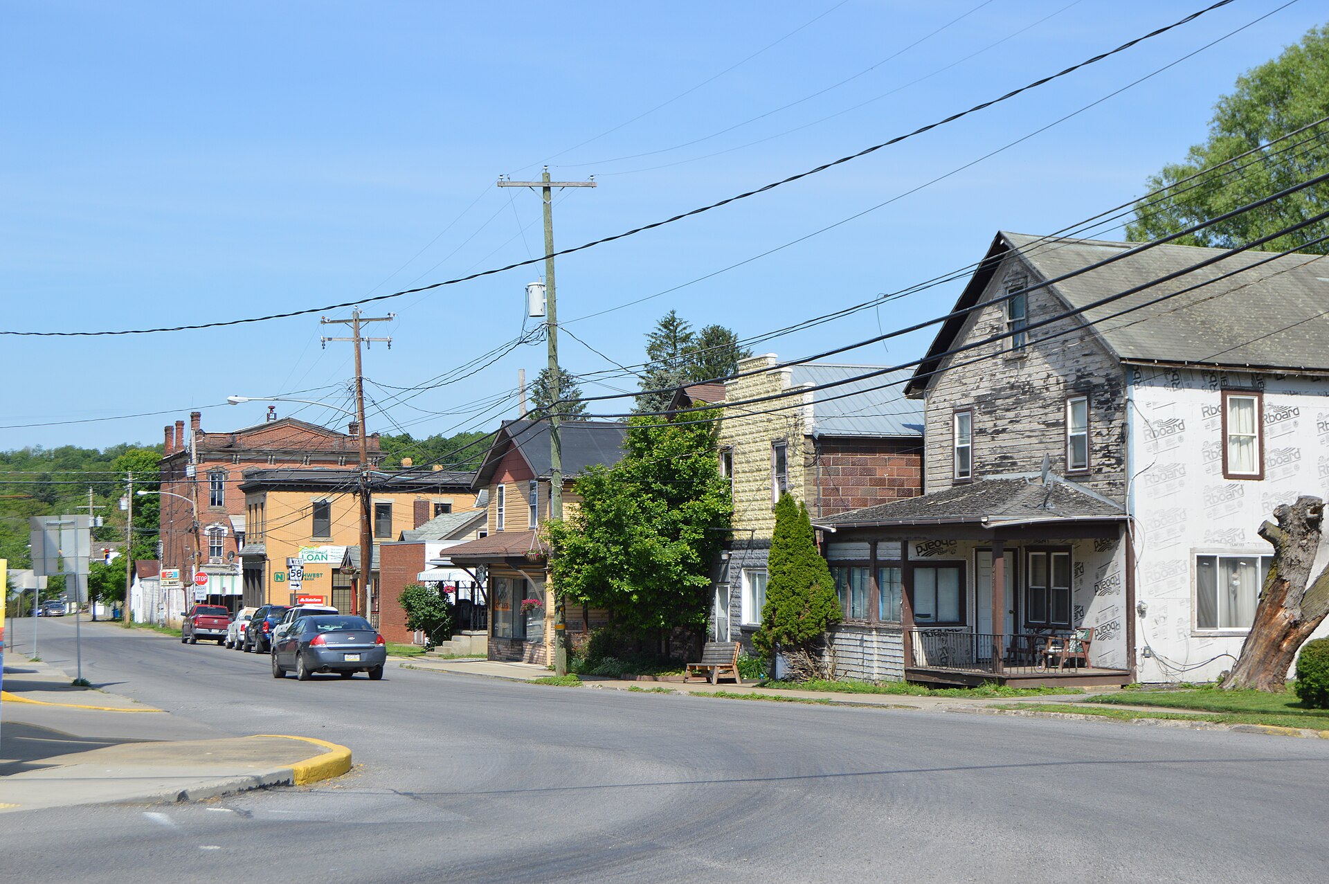 Buildings on the northern side of Bald Eagle Street (Pennsylvania Route 58), seen looking west from the Colerain Street intersection, in Sligo, Pennsylvania, United States.