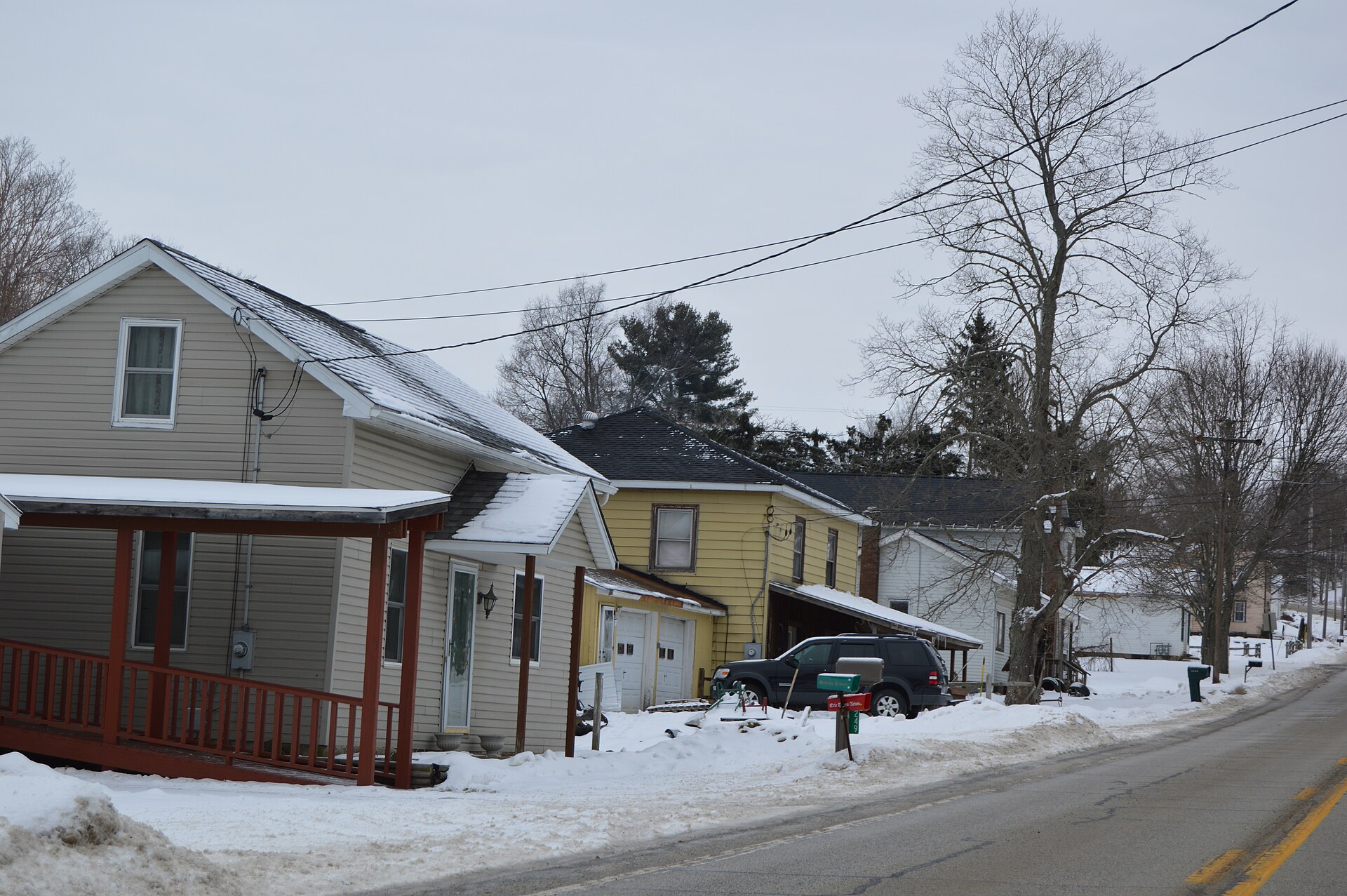 Houses on the western side of Main Street (Pennsylvania Route 86) in southern Woodcock, Pennsylvania, United States.