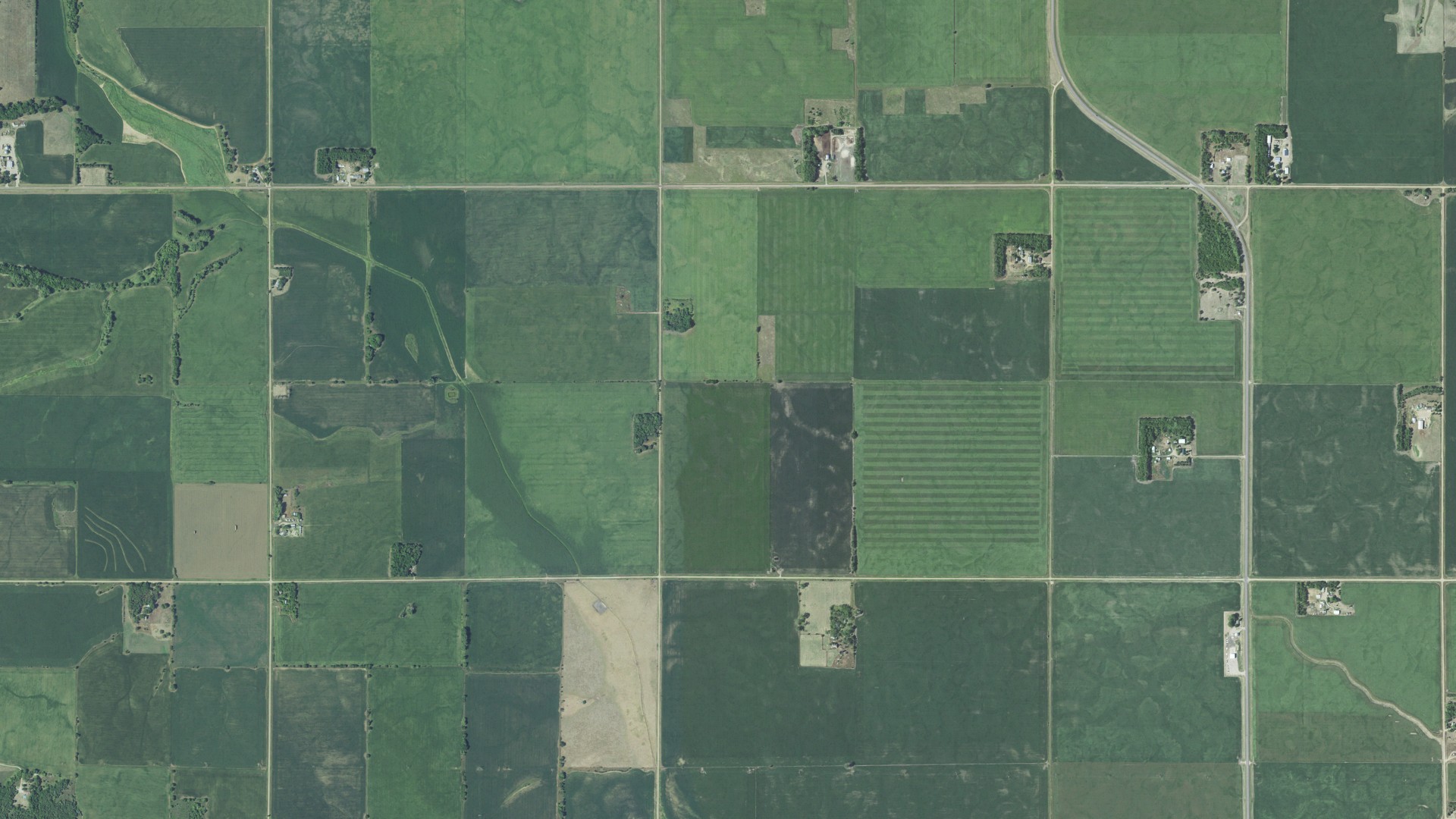 Natural-color aerial photograph of land around Clay County, South Dakota